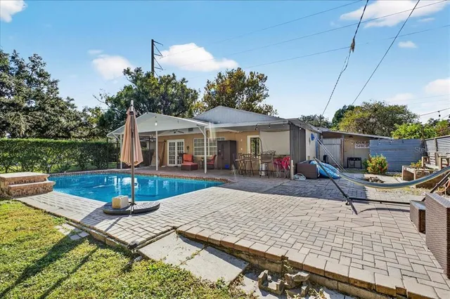 a view of house with patio outdoor seating