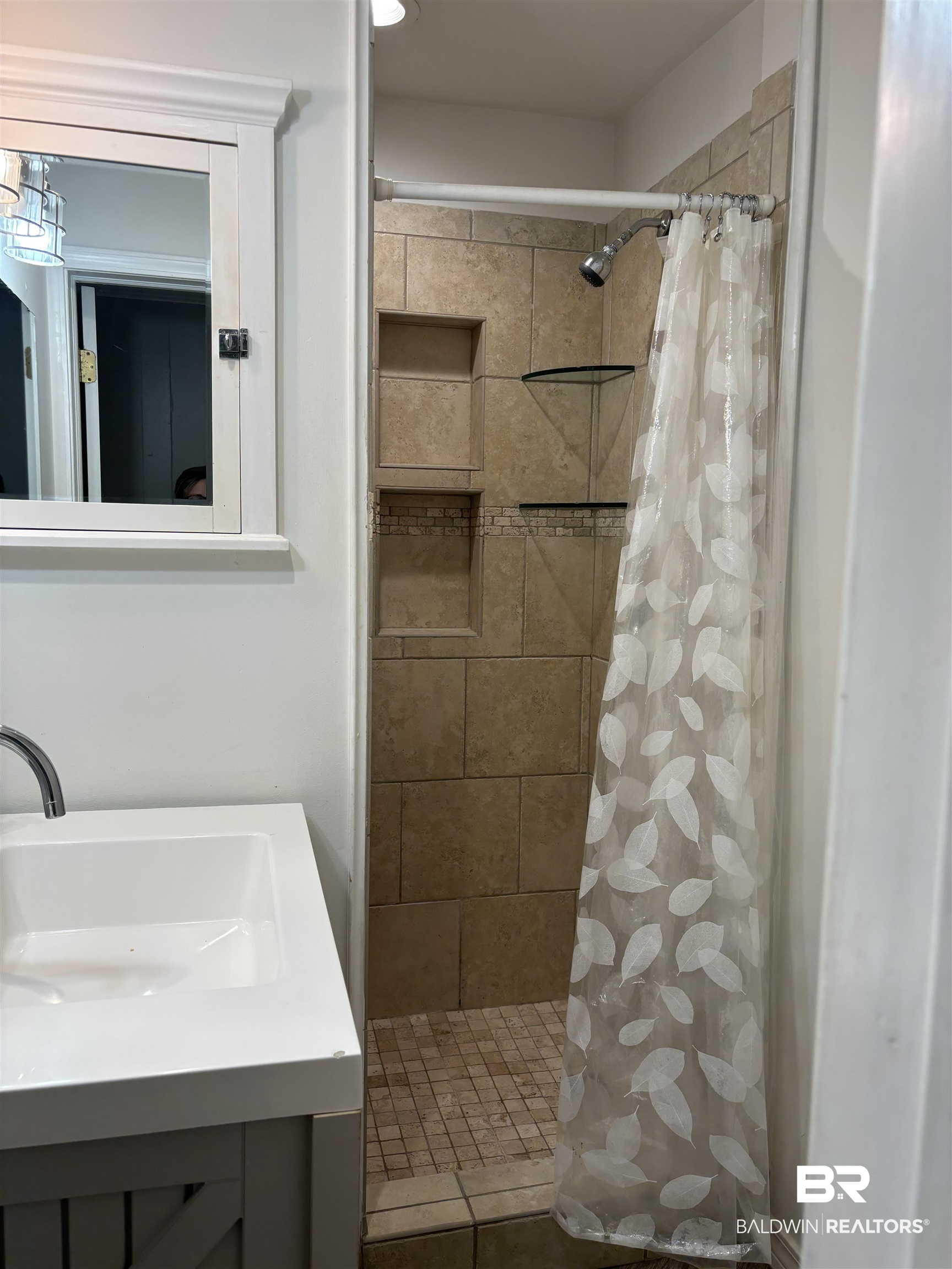 48 Hathaway Road West Mobile, AL 36608 - Photo 17 of 40 Bathroom featuring vanity and a shower with curtain