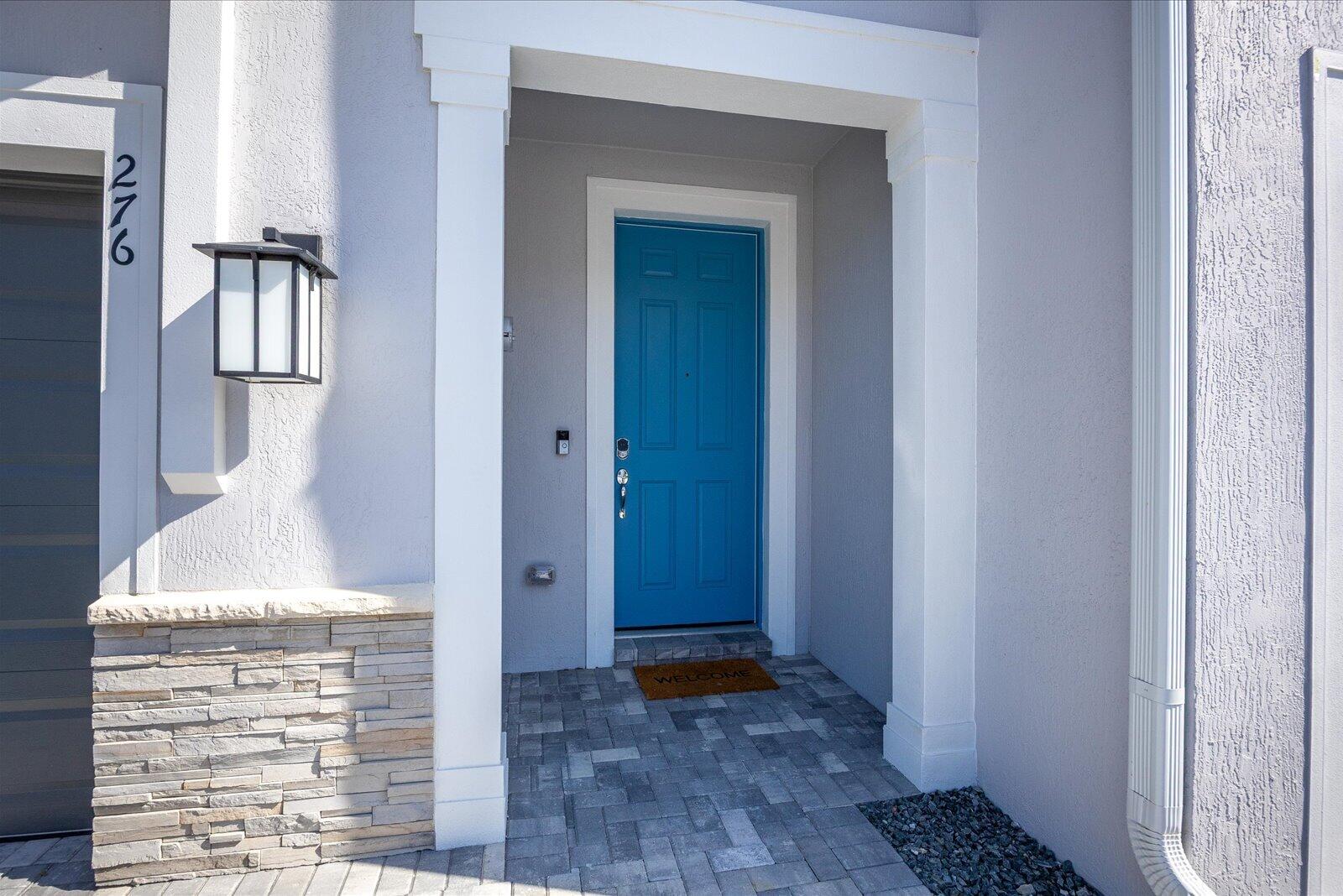 276 Southwest Sally Way Stuart, FL 34997 - Photo 4 of 36 Door