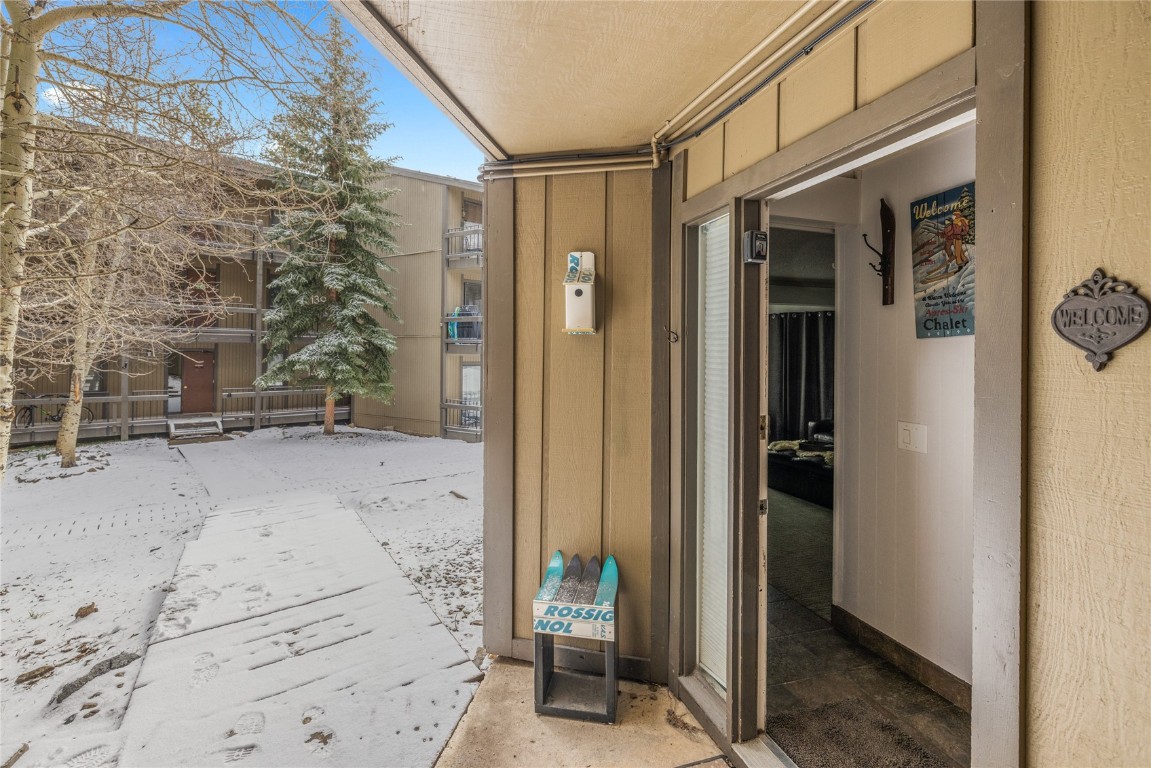 1179 Ski Hill Road, Unit 147 Breckenridge, CO 80424 - Photo 25 of 43 a view of a door and a chair
