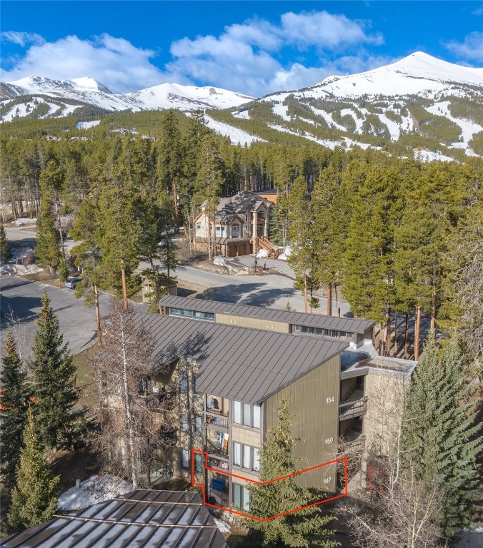 1179 Ski Hill Road, Unit 147 Breckenridge, CO 80424 - Photo 32 of 43 a view of a house with a yard