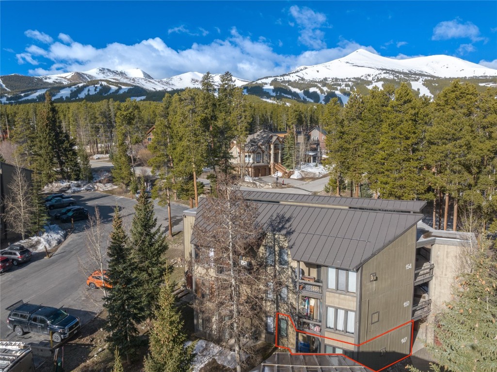 1179 Ski Hill Road, Unit 147 Breckenridge, CO 80424 - Photo 39 of 43 a view of a house with a yard from a balcony