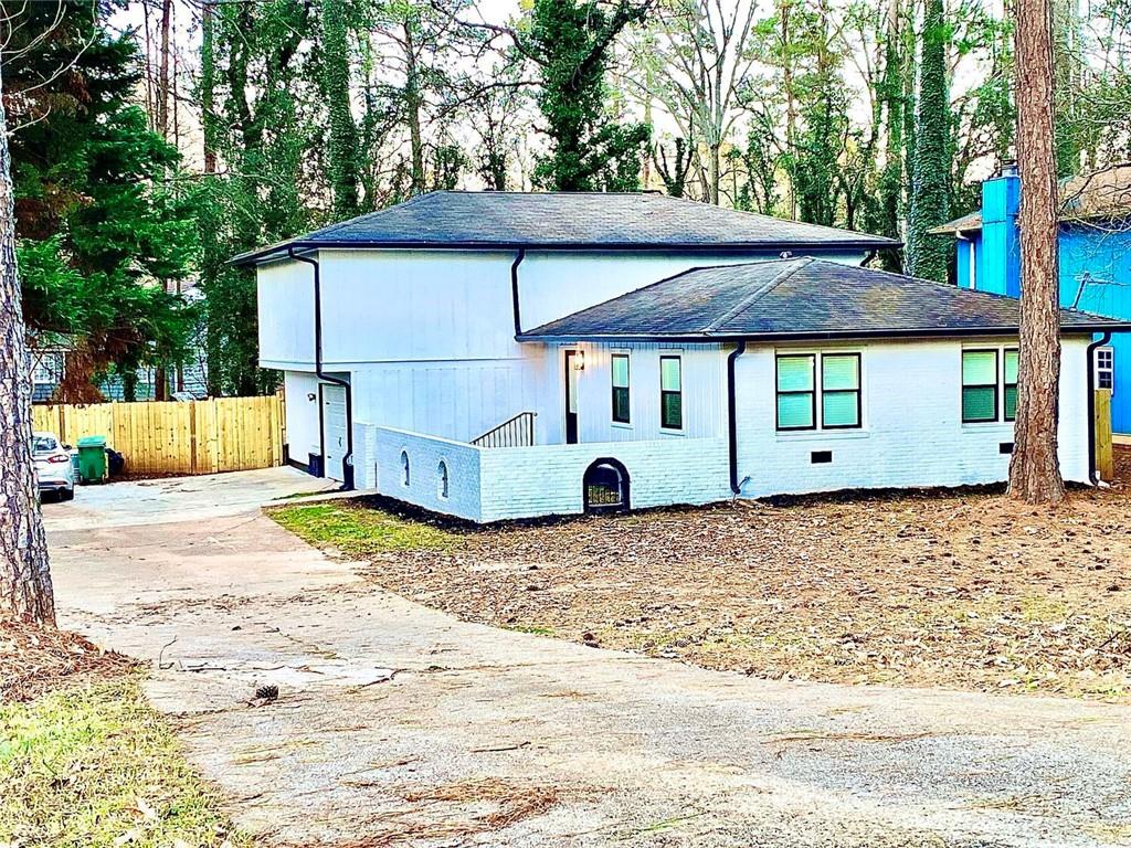 5390 Rockbridge Road Southwest Stone Mountain, GA 30088 - Photo 3 of 49