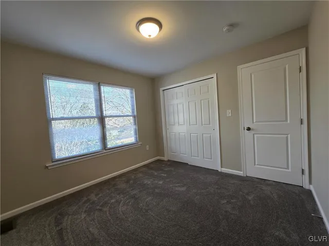 a bathroom with a toilet a sink and bathtub