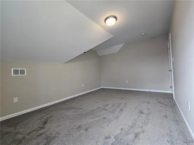 a house with trees in front of it