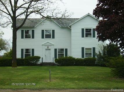 1795 Oak Grove Road Howell, MI 48855 - Photo 1 of 14 Front