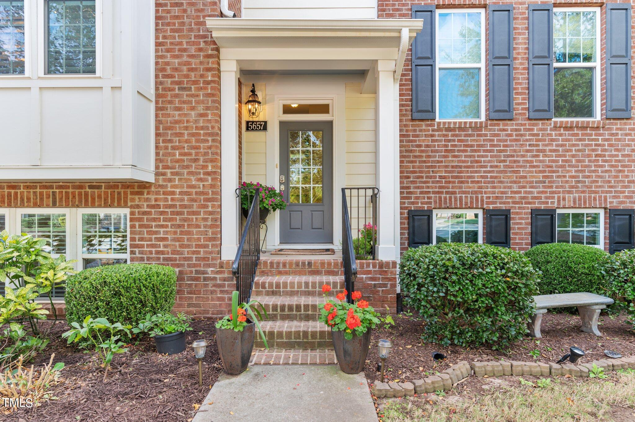 5657 Wade Park Boulevard Raleigh, NC 27607 - Photo 2 of 24 Pleasing front covered porch.