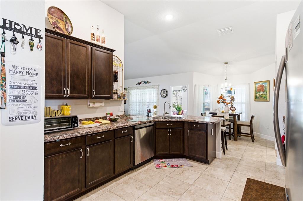 12181 Topaz Street Spring Hill, FL 34608 - Photo 23 of 71 a kitchen with lots of counter top space