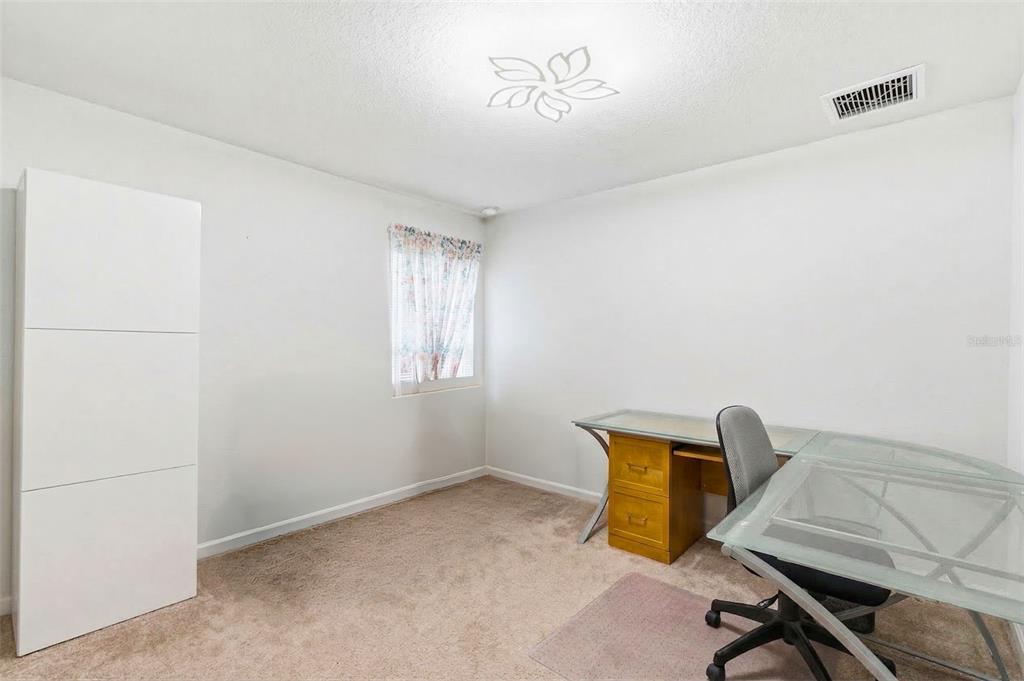 12181 Topaz Street Spring Hill, FL 34608 - Photo 41 of 71 a room with a window