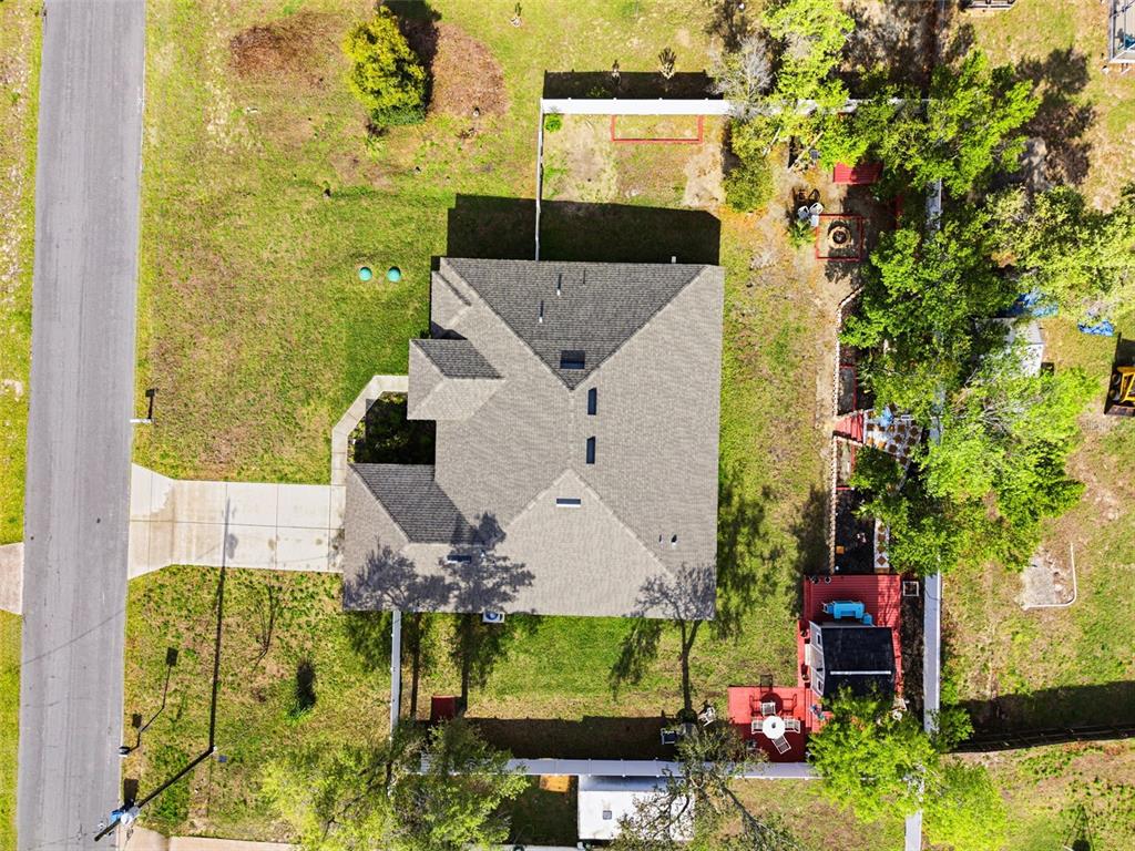12181 Topaz Street Spring Hill, FL 34608 - Photo 61 of 71 an aerial view of a house with a yard