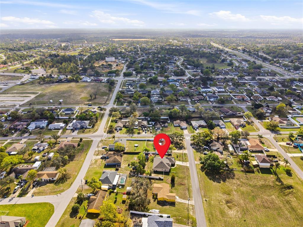 12181 Topaz Street Spring Hill, FL 34608 - Photo 69 of 71 an aerial view of residential houses with outdoor space