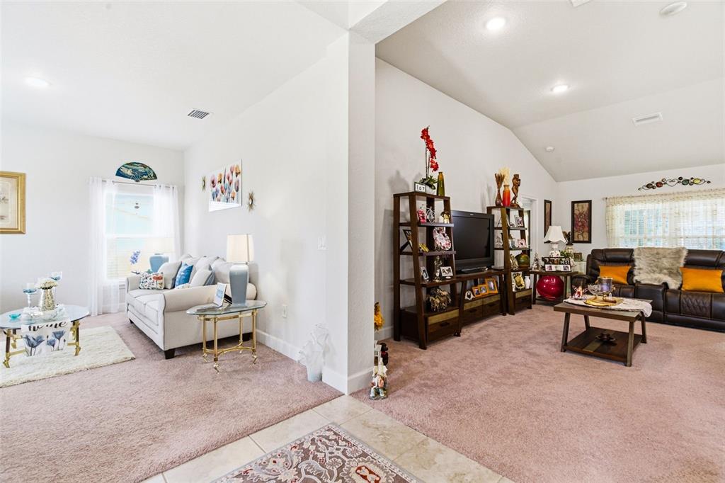 12181 Topaz Street Spring Hill, FL 34608 - Photo 8 of 71 a view of a livingroom with furniture and white walls