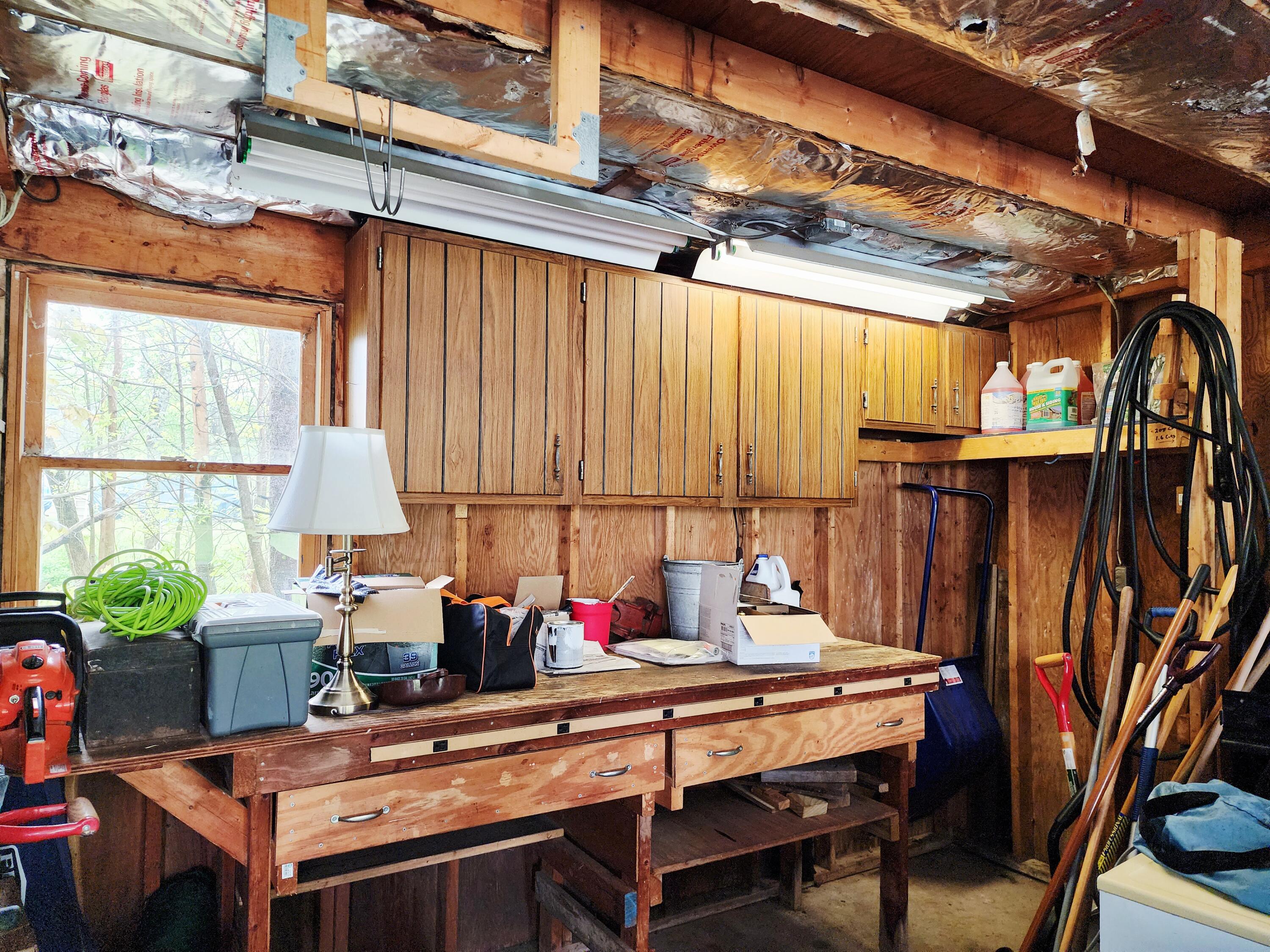 136 Hallowell Road Augusta, ME 04330 - Photo 55 of 57 Garage workbench downstairs