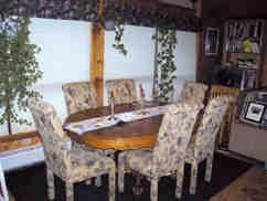 166 Merritt Road Otis, MA 01253 - Photo 3 of 11 a dining room with furniture and chandelier