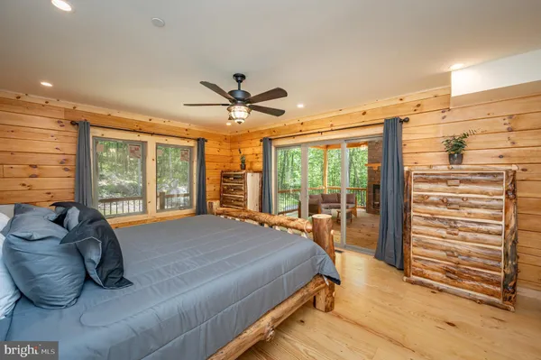 a room with pool table and furniture