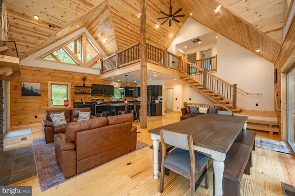 a kitchen with a large window and a sink