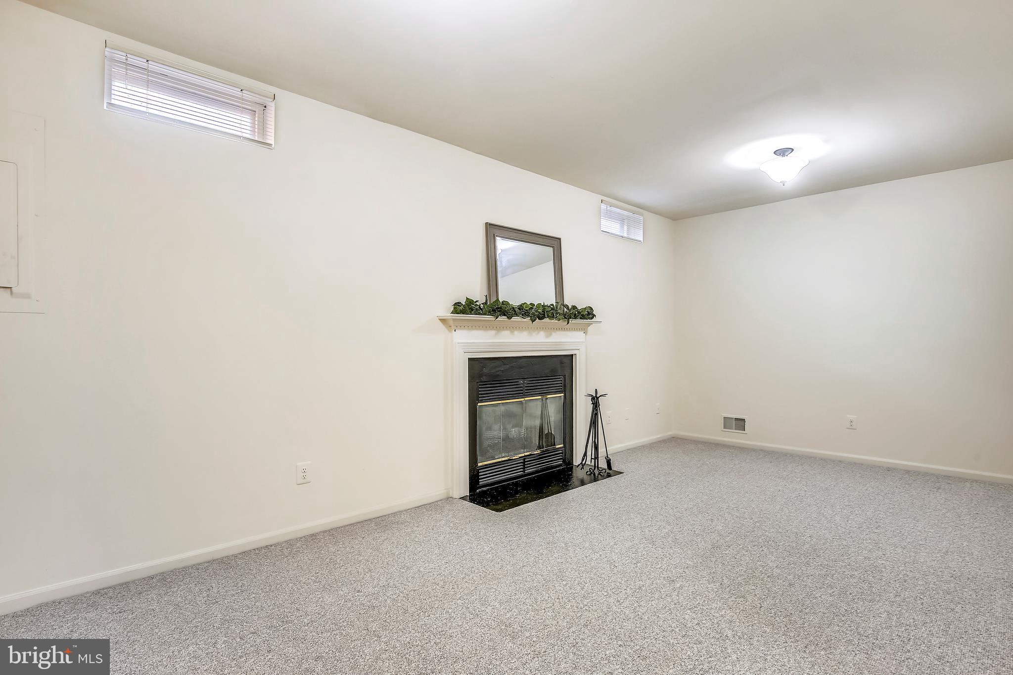 6503 Castine Lane Springfield, VA 22150 - Photo 45 of 54 Rec room with fireplace