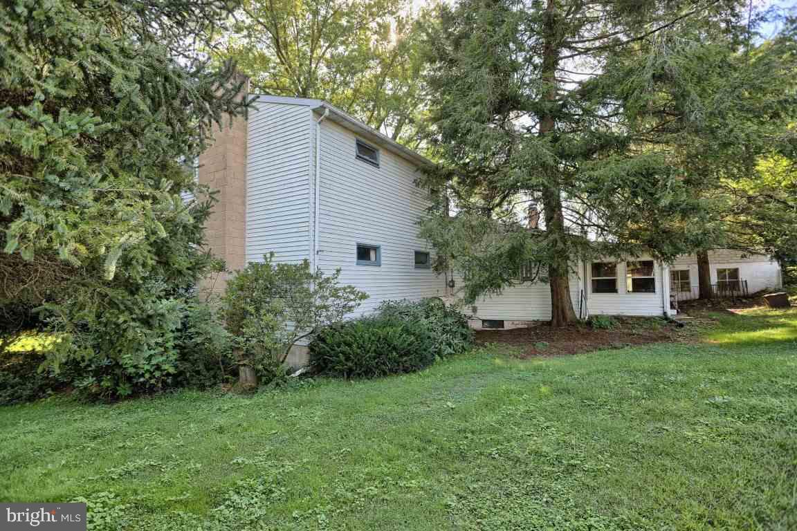 3475 Valley Road Marysville, PA 17053 - Photo 23 of 25 a view of a backyard with plants and large tree