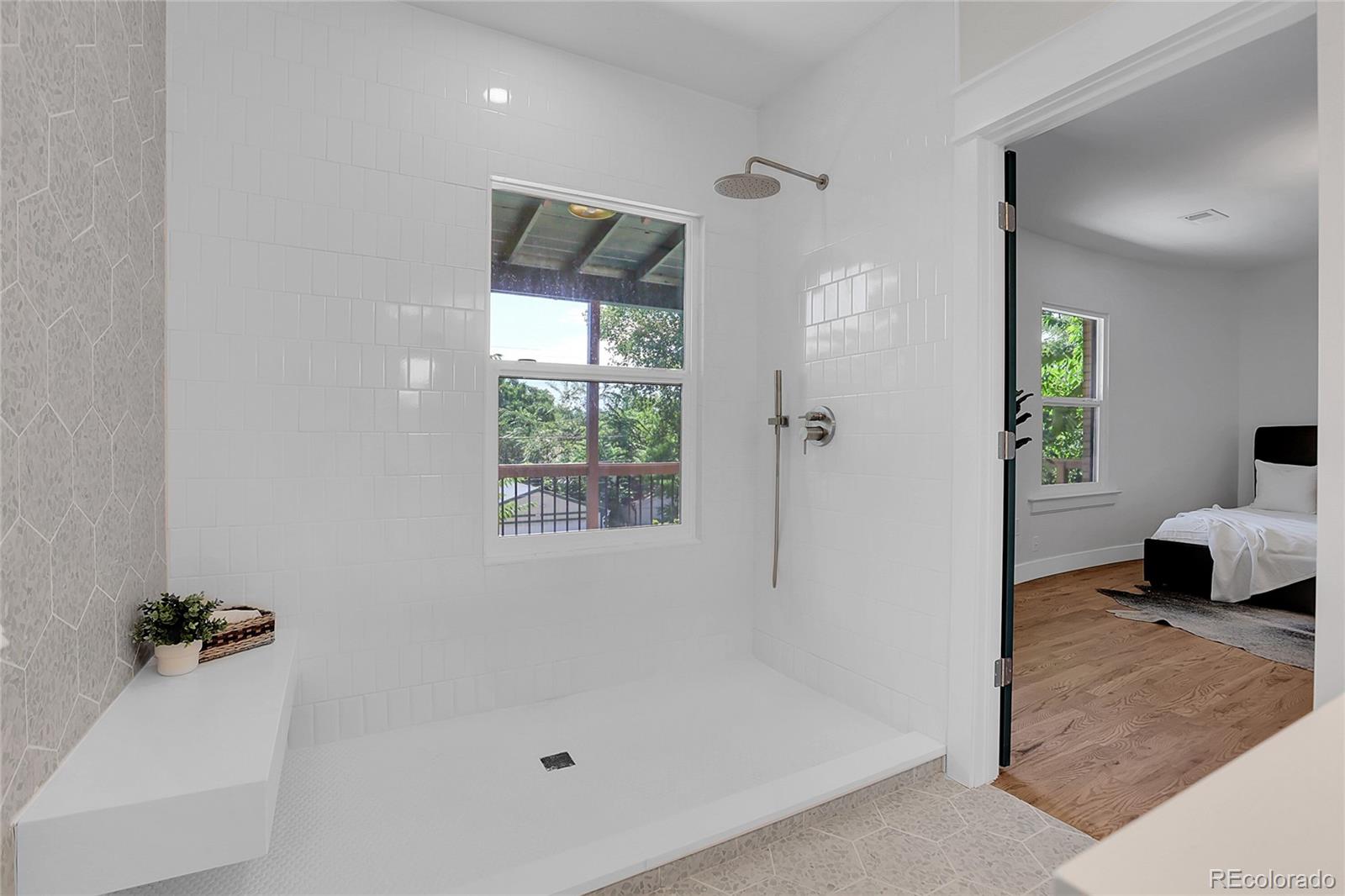 1260 Garfield Street Denver, CO 80206 - Photo 15 of 24 a en suite bathroom with a tub and shower