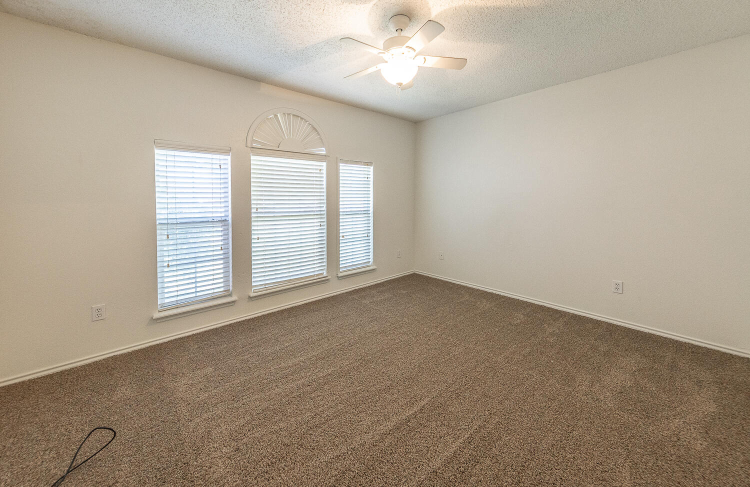 6109 13th Street Lubbock, TX 79416 - Photo 14 of 24 an empty room with a window