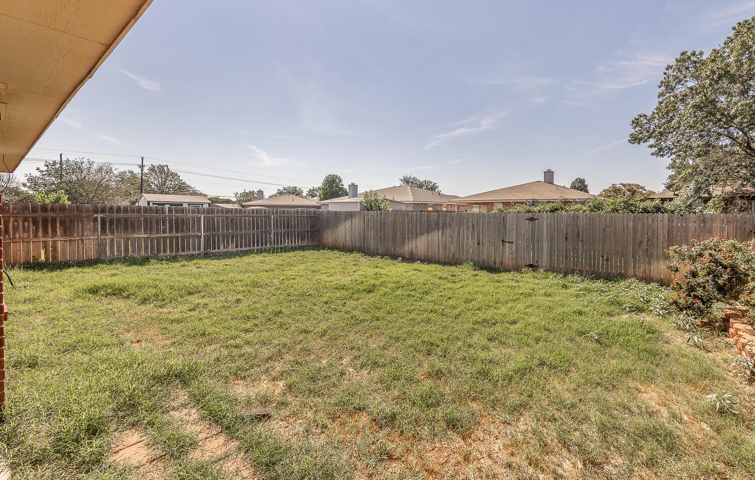 6109 13th Street Lubbock, TX 79416 - Photo 20 of 24 a view of a backyard