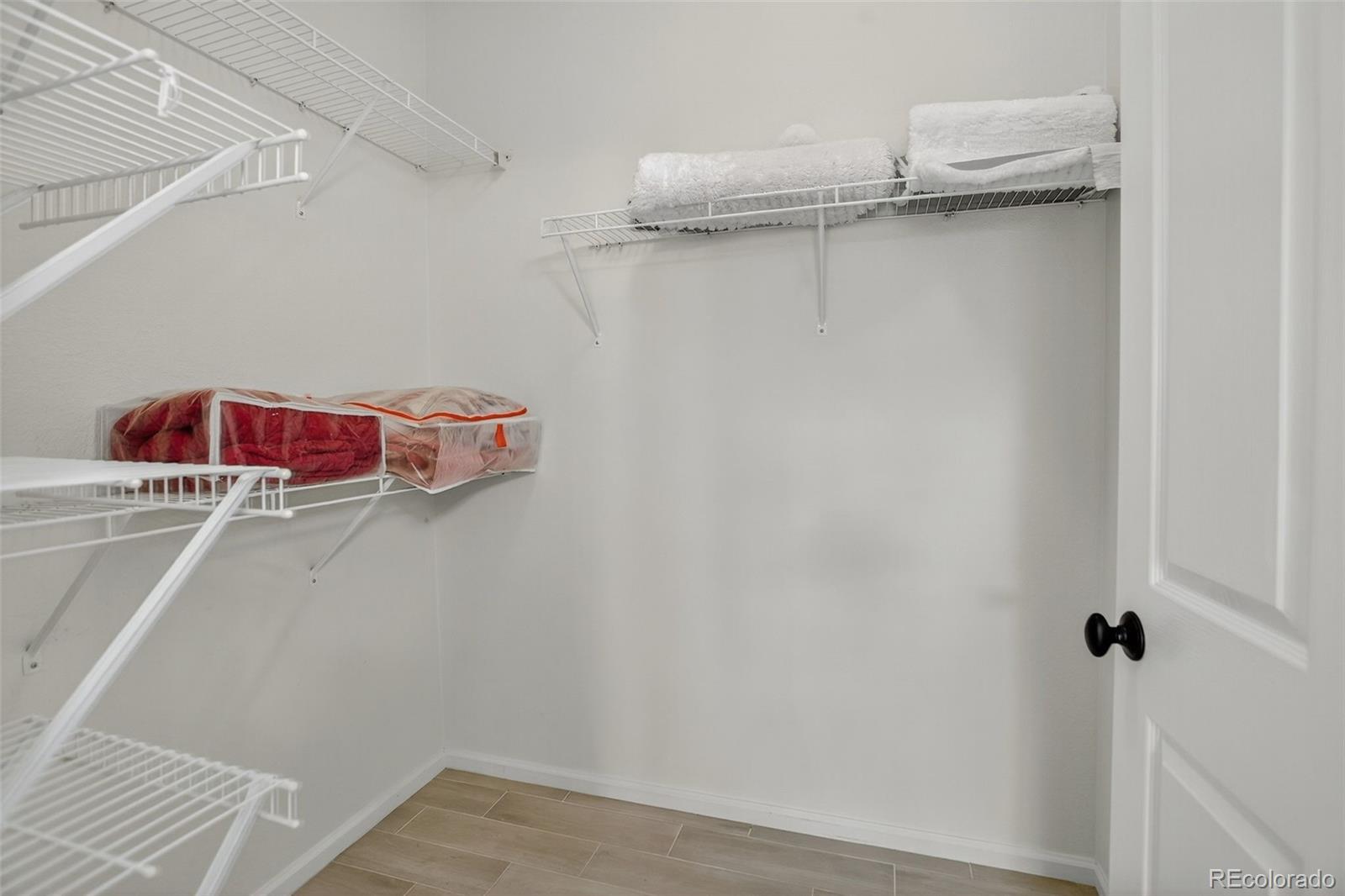 203 Remuda Lane, Unit 203 Lafayette, CO 80026 - Photo 24 of 35 view of a room with shelf