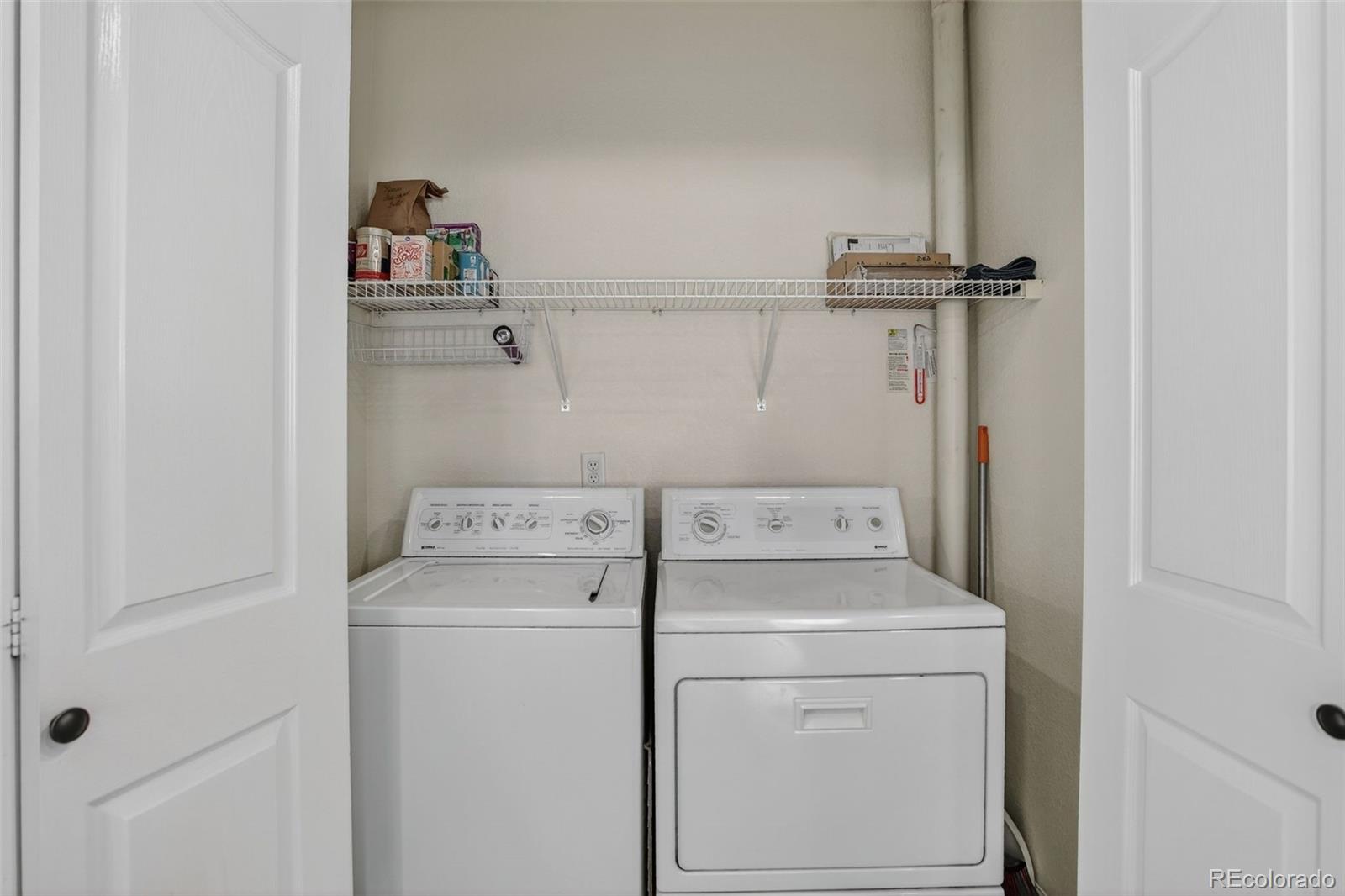 203 Remuda Lane, Unit 203 Lafayette, CO 80026 - Photo 27 of 35 a utility room with dryer and washer