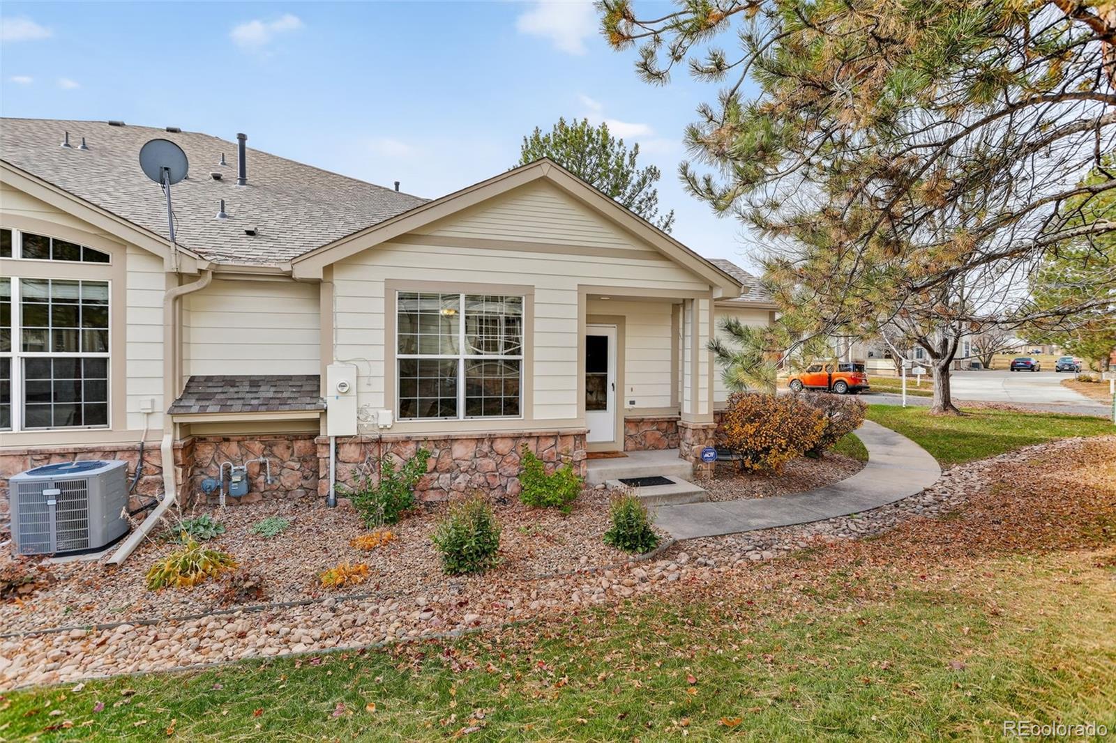 203 Remuda Lane, Unit 203 Lafayette, CO 80026 - Photo 30 of 35 a view of a house with backyard and sitting area