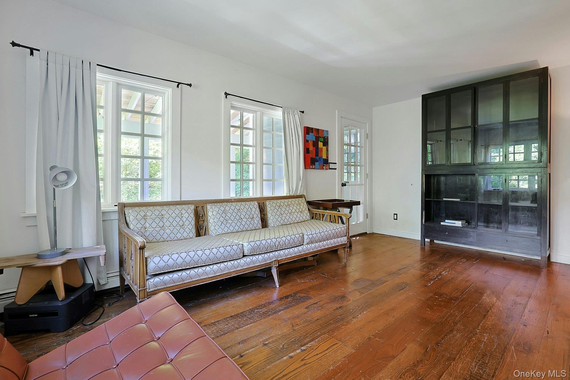 65 Douglas Road Chappaqua, NY 10514 - Photo 8 of 41 Sunlight pours in, highlighting the rich hardwood floors.