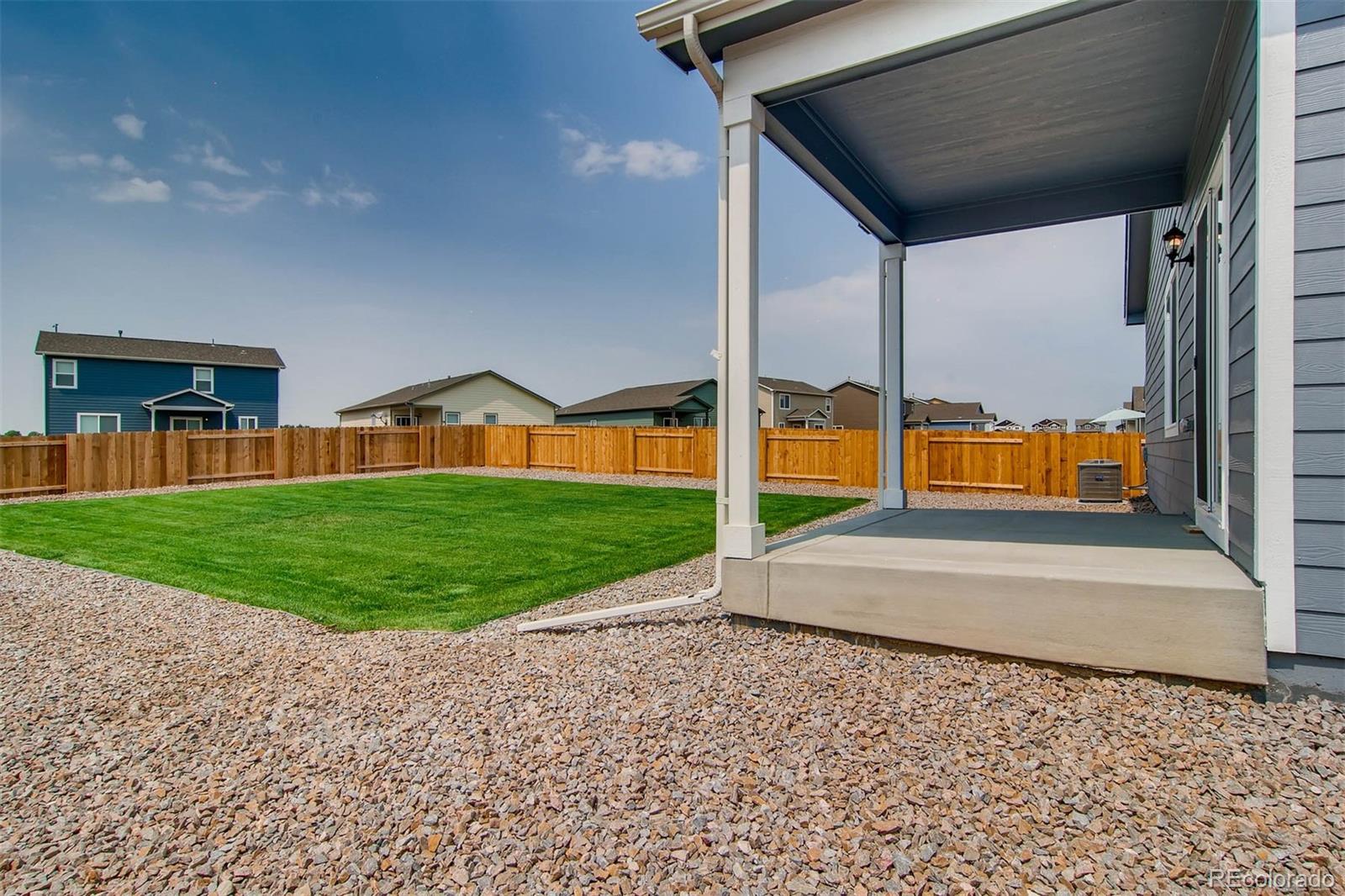 2299 Murray Street Mead, CO 80504 - Photo 10 of 17 a view of building with yard