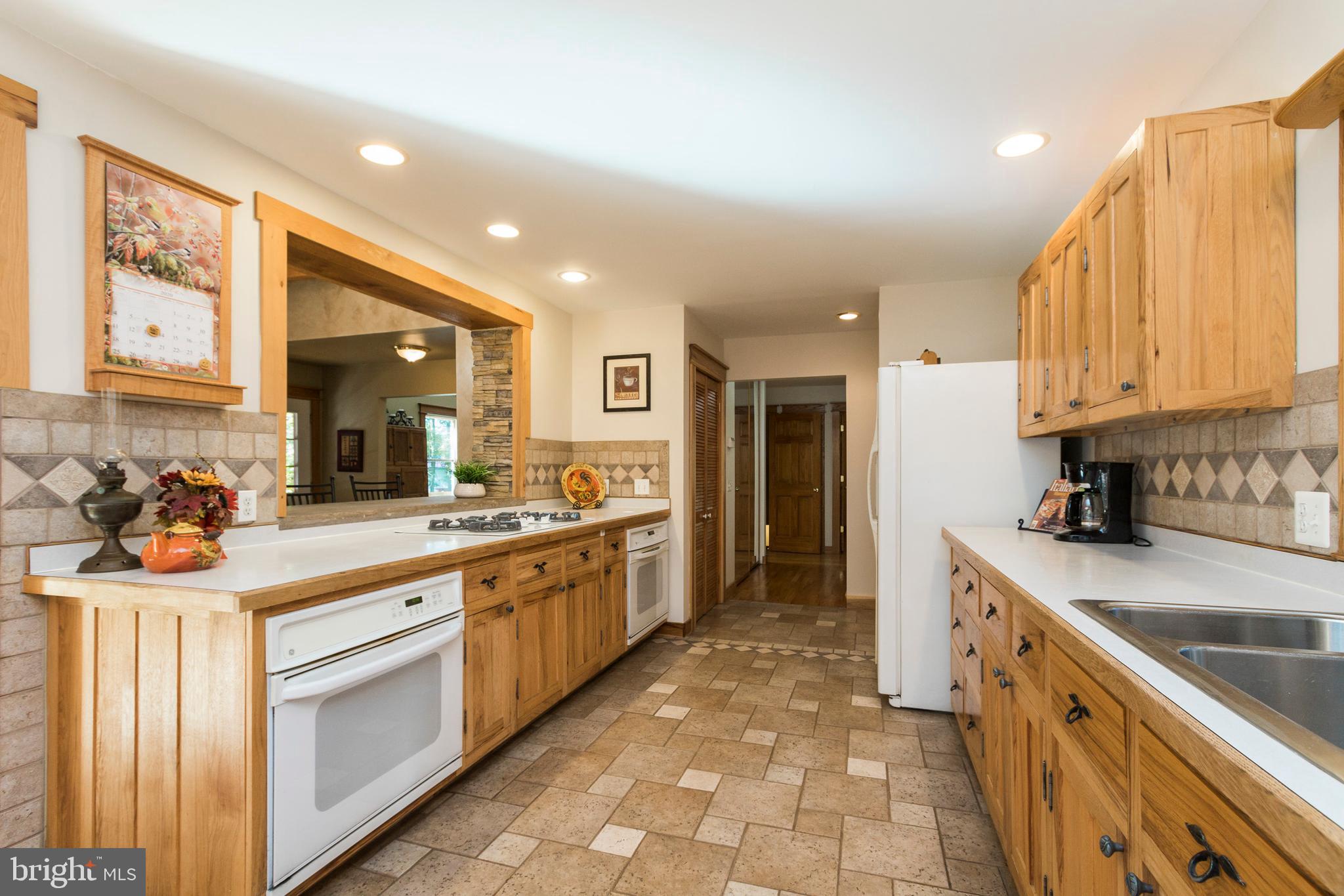 5737 Balls Mill Road Midland, VA 22728 - Photo 18 of 71 Kitchen Opens to Pantry & Hall to Main Level BRs