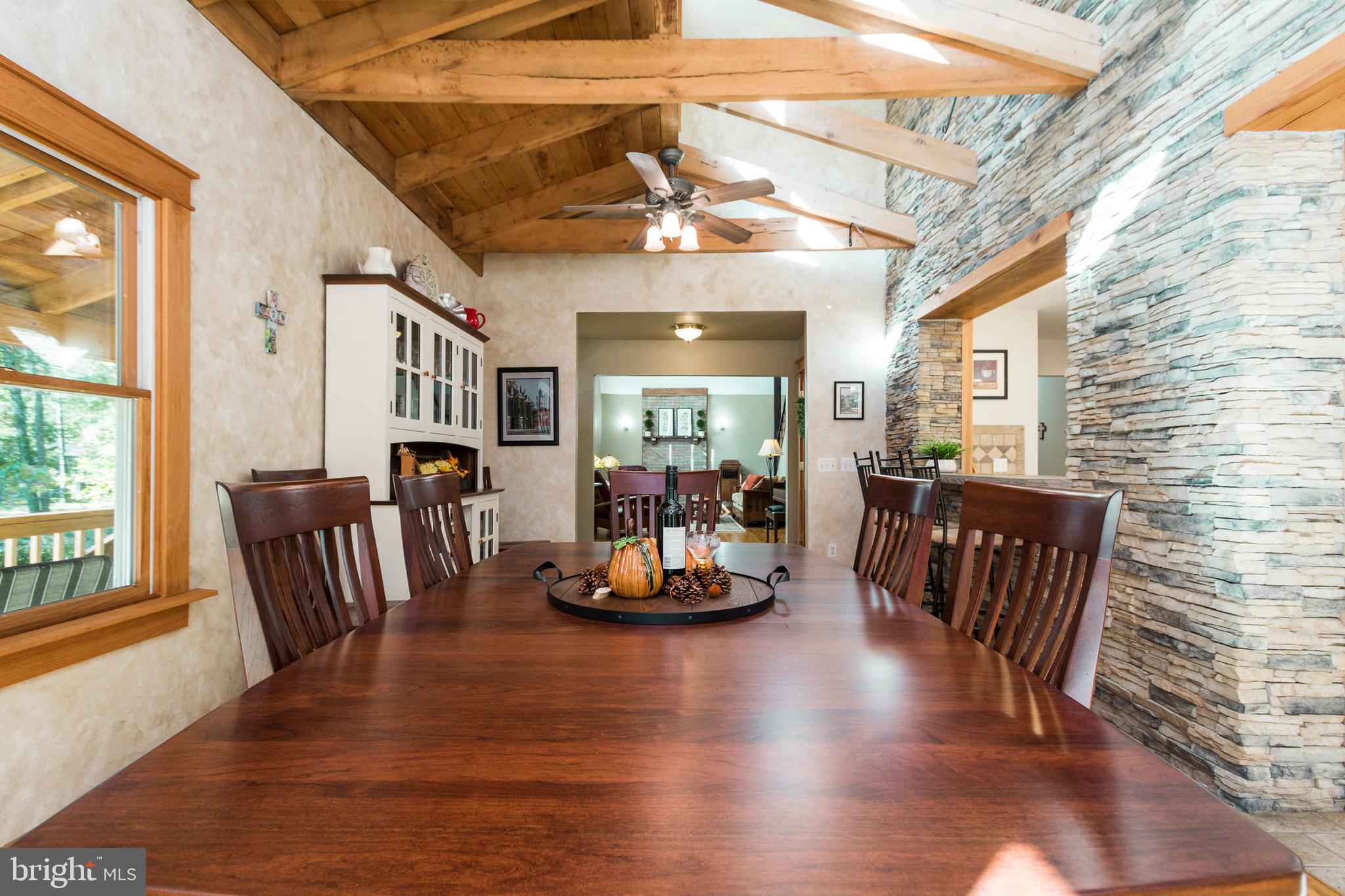 5737 Balls Mill Road Midland, VA 22728 - Photo 21 of 71 Dining Room with Striking Stacked Faux Stone Wall