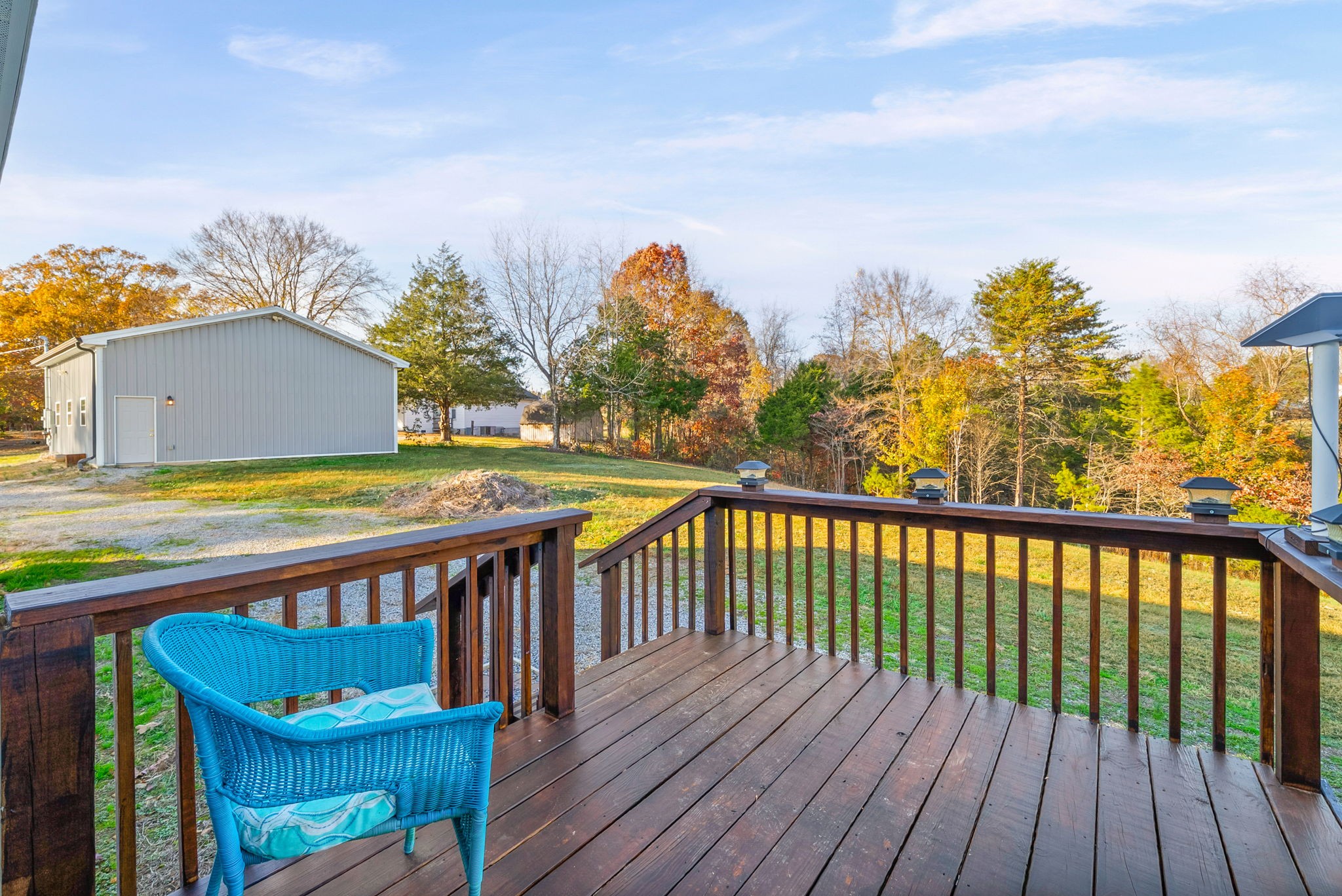 111 Antioch Road Charlotte, TN 37036 - Photo 28 of 39 a view of a roof deck with wooden floor and fence