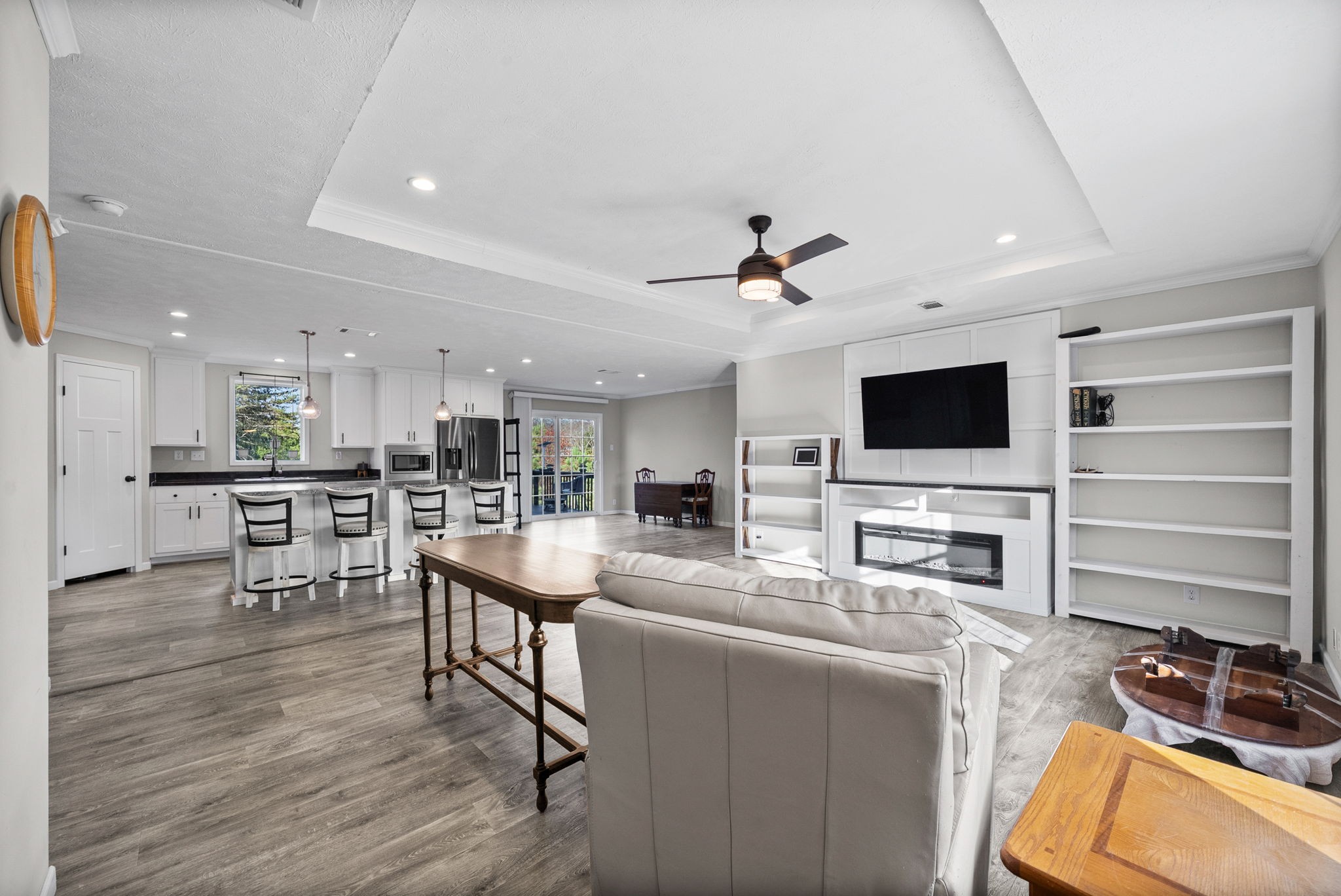 111 Antioch Road Charlotte, TN 37036 - Photo 5 of 39 a living room with furniture and flat screen tv