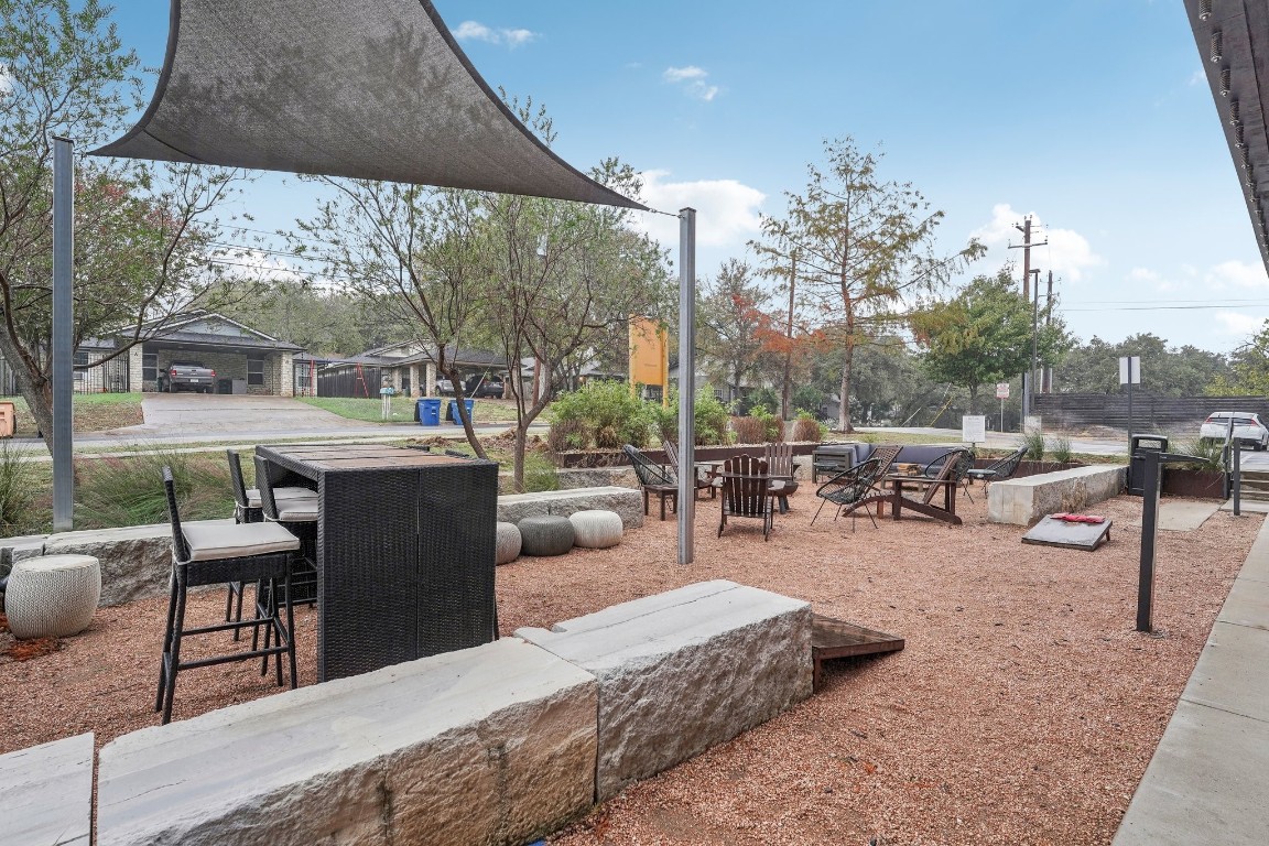 2505 Thornton Road, Unit 2307 Austin, TX 78704 - Photo 32 of 36 a view of a patio with swimming pool