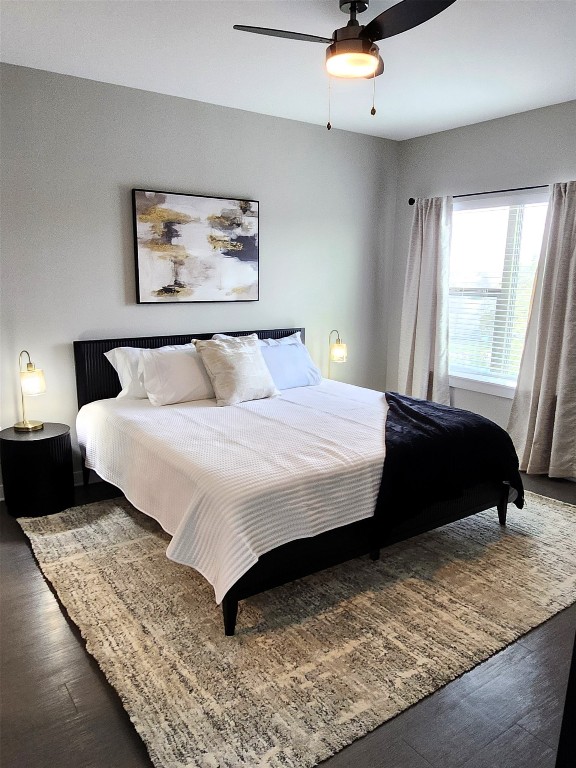 2505 Thornton Road, Unit 2307 Austin, TX 78704 - Photo 5 of 36 a bedroom with a bed and wooden floor