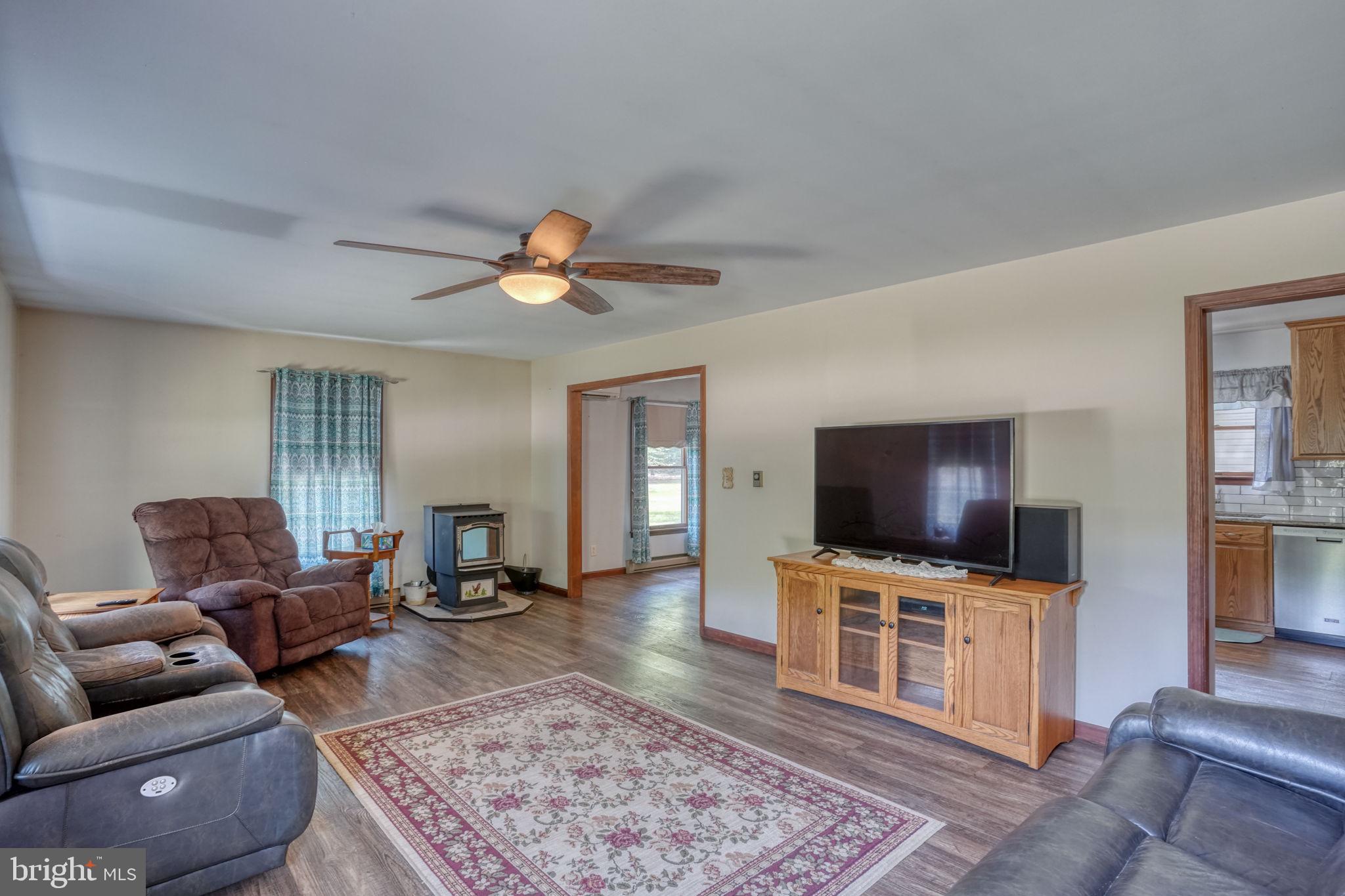 12484 Greensboro Road Greensboro, MD 21639 - Photo 19 of 50 Cozy living space with inviting warmth.