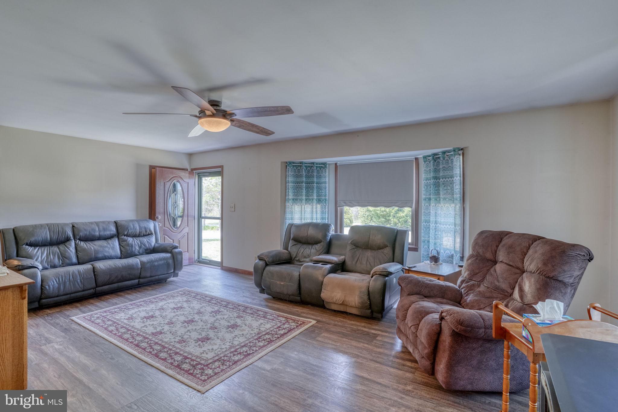 12484 Greensboro Road Greensboro, MD 21639 - Photo 21 of 50 Spacious living area with natural light.
