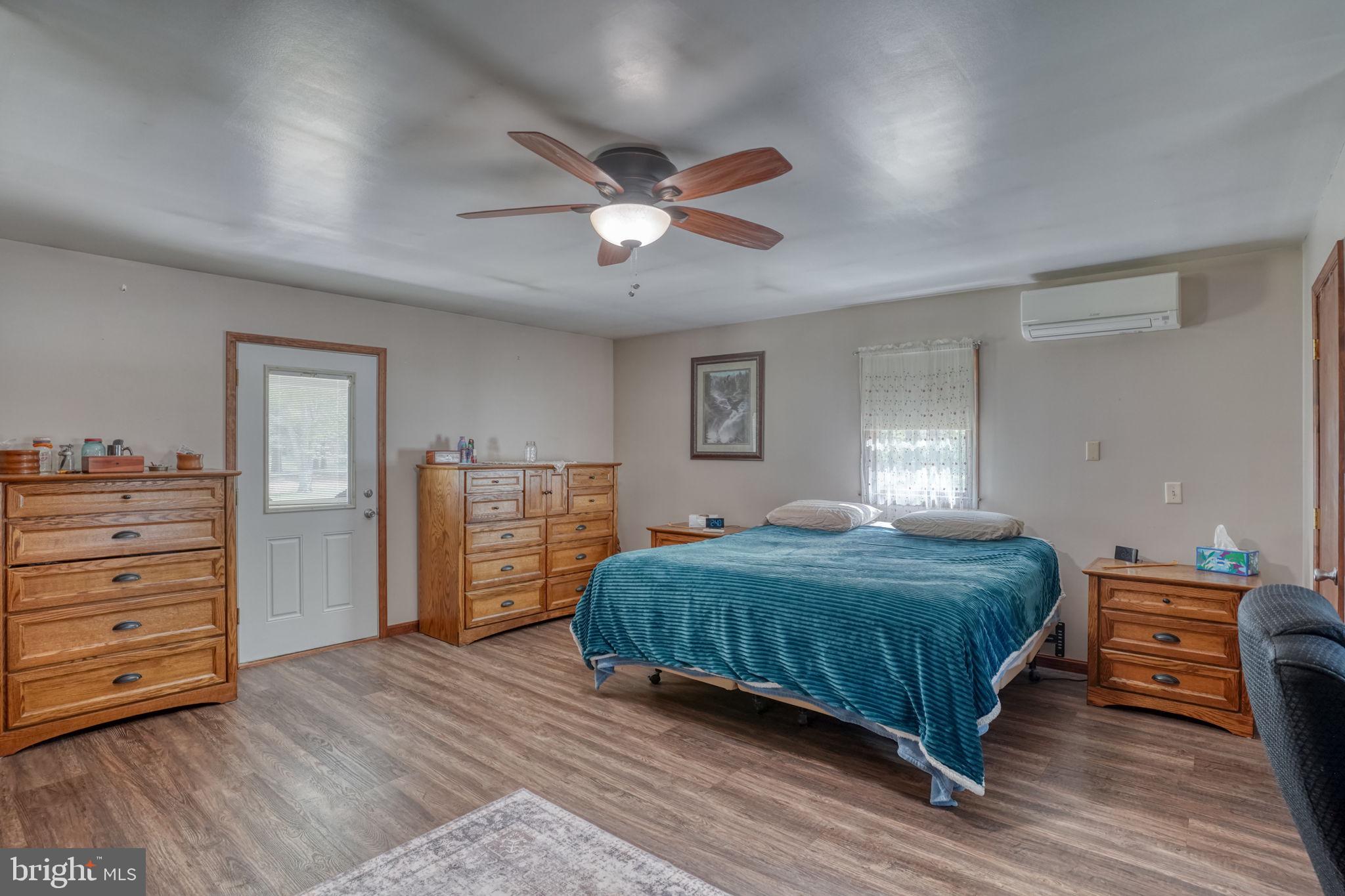 12484 Greensboro Road Greensboro, MD 21639 - Photo 26 of 50 Spacious bedroom with natural light.