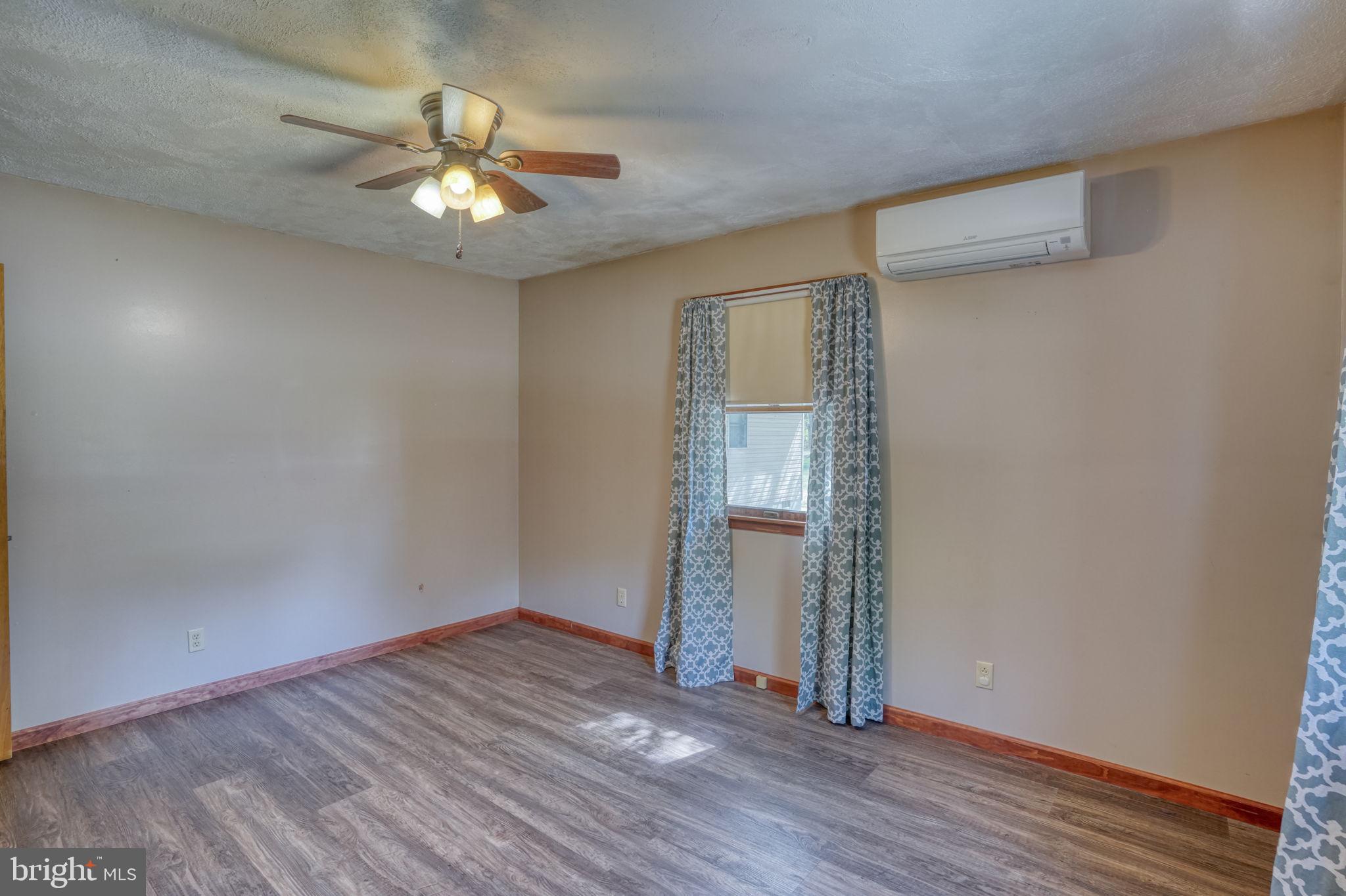12484 Greensboro Road Greensboro, MD 21639 - Photo 34 of 50 Bright and airy room with charm.