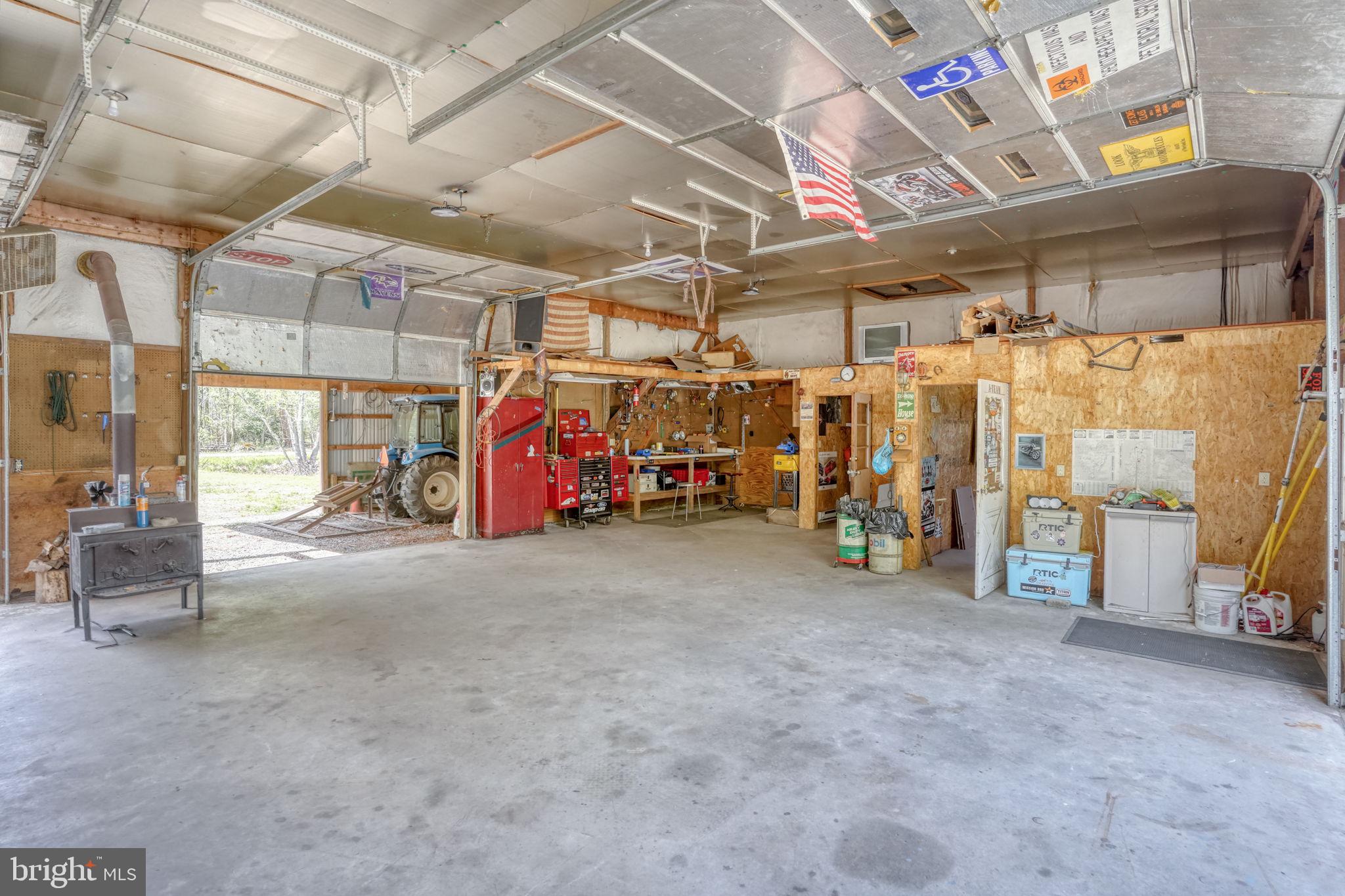 12484 Greensboro Road Greensboro, MD 21639 - Photo 43 of 50 Spacious workshop with rustic charm.