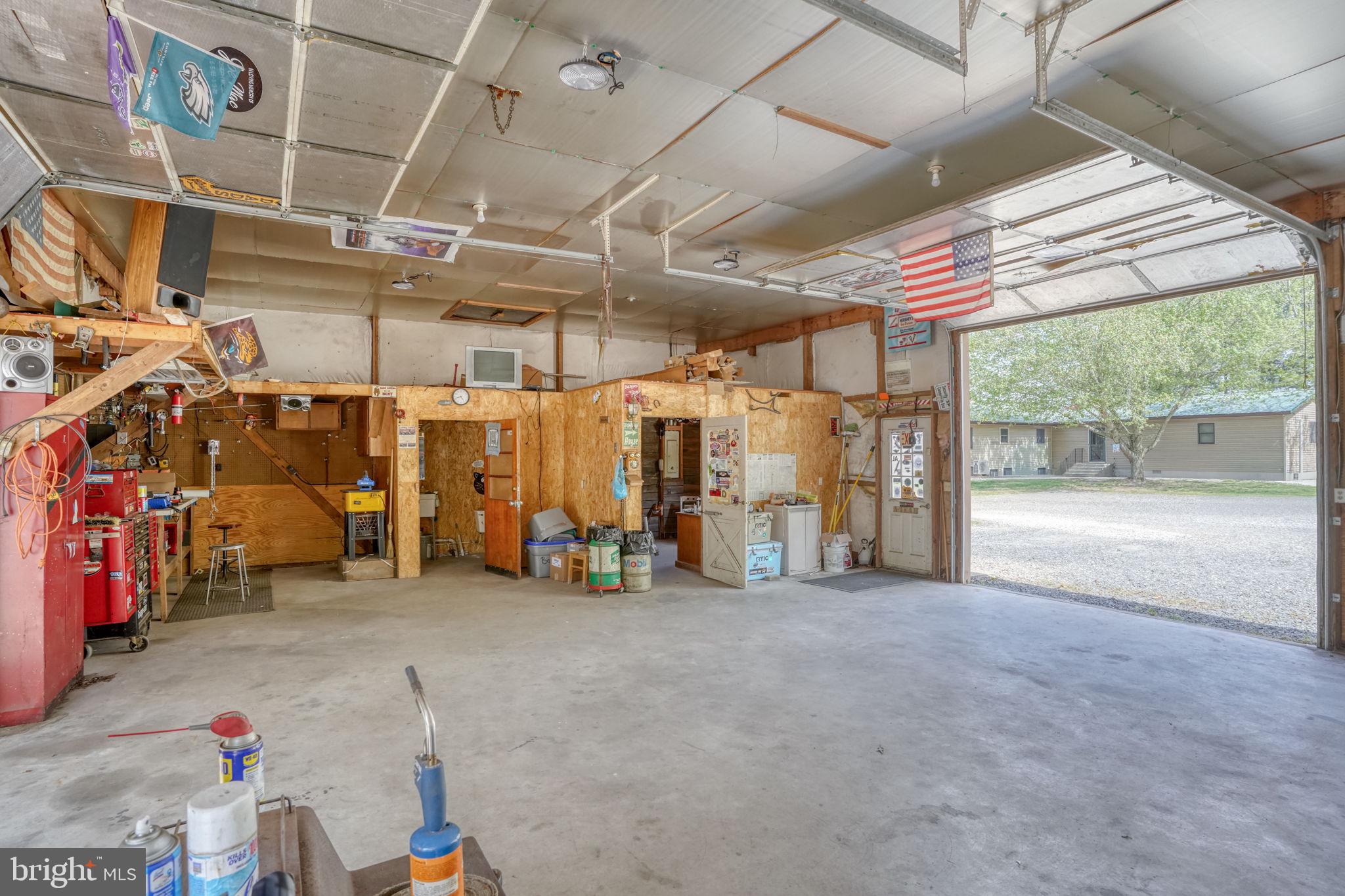 12484 Greensboro Road Greensboro, MD 21639 - Photo 45 of 50 Spacious garage with rustic charm.