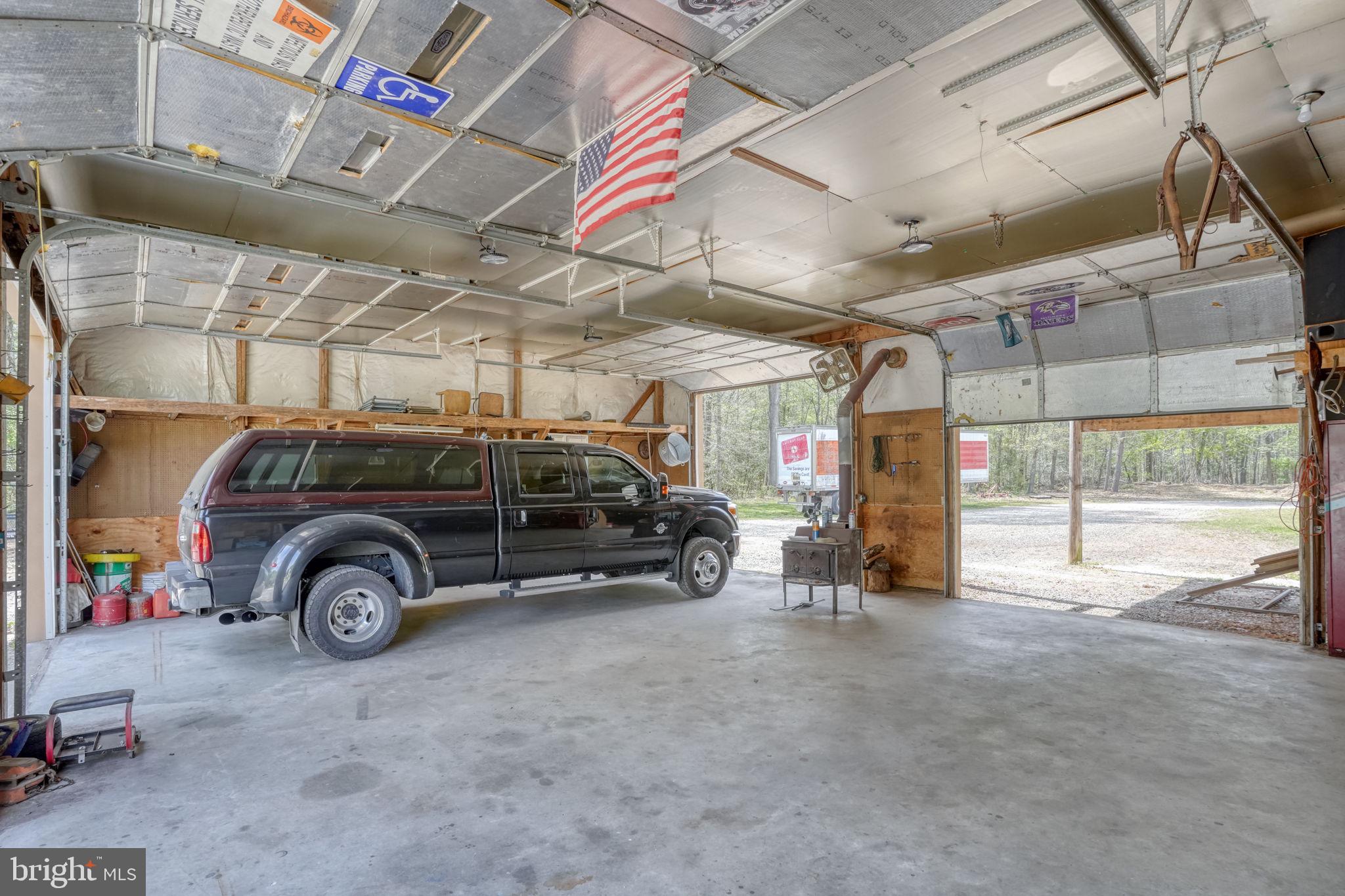 12484 Greensboro Road Greensboro, MD 21639 - Photo 48 of 50 Spacious garage with ample natural light.