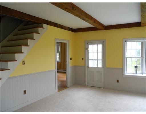 131 Watson Heights Road Kents Hill, ME 04349 - Photo 5 of 22 Living Room. Living Room & Stairs to...
