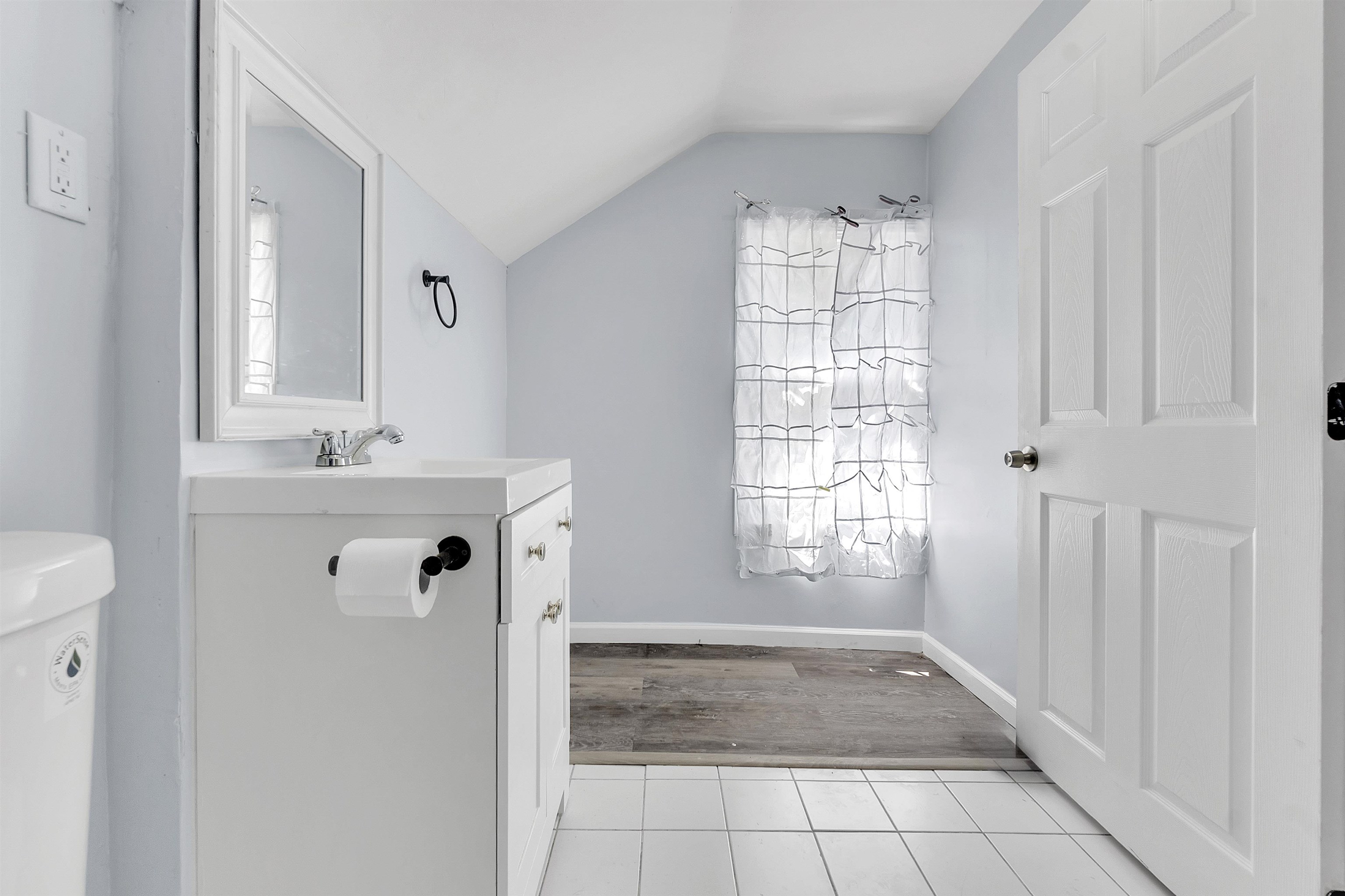 1682 Pendleton Street Memphis, TN 38114 - Photo 12 of 36 a bathroom with a sink a window and shower