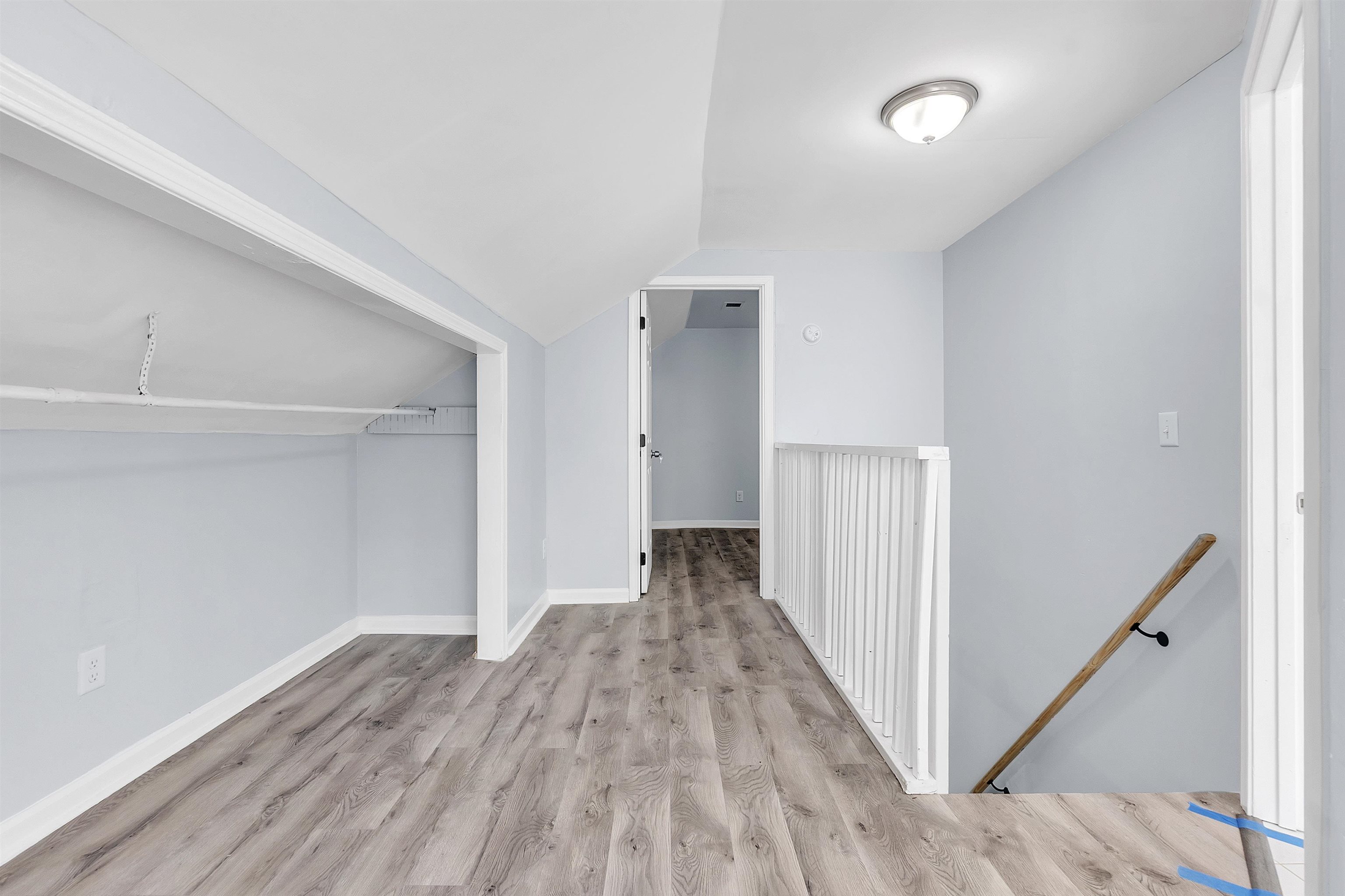 1682 Pendleton Street Memphis, TN 38114 - Photo 16 of 36 a view of a hallway with wooden floor and entryway