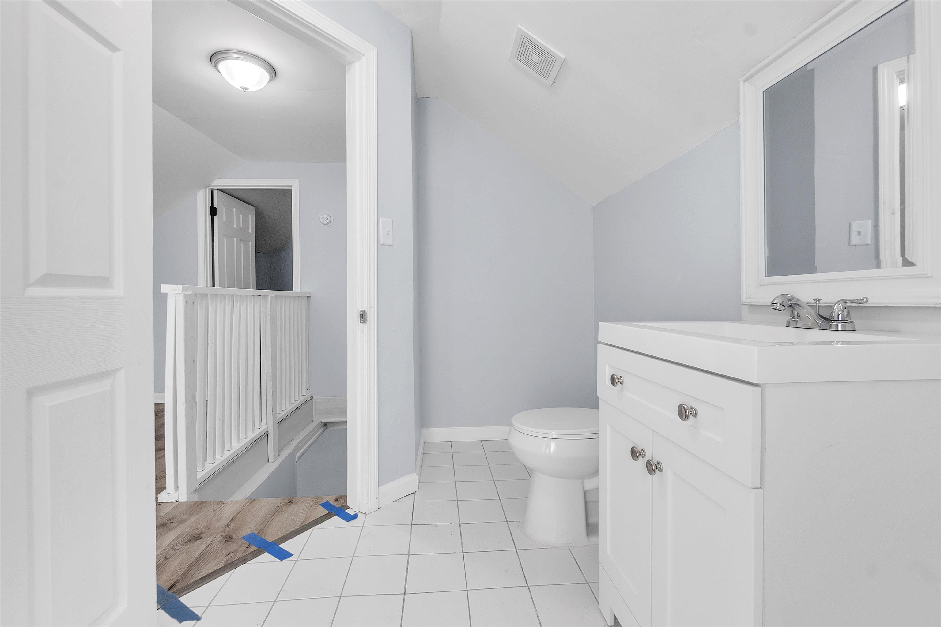 1682 Pendleton Street Memphis, TN 38114 - Photo 17 of 36 a bathroom with a sink a toilet and a mirror