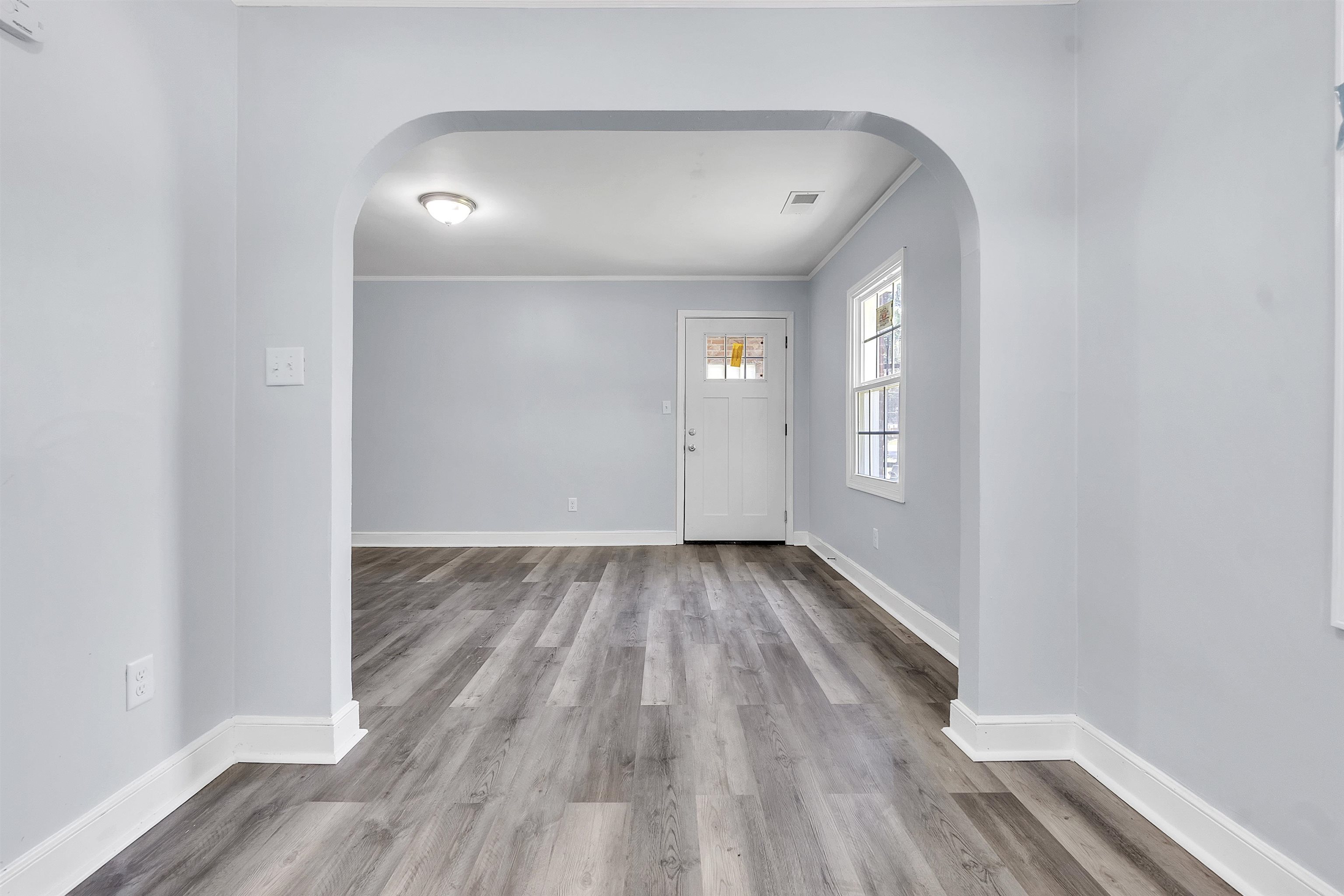 1682 Pendleton Street Memphis, TN 38114 - Photo 18 of 36 a view of a room with wooden floor and window