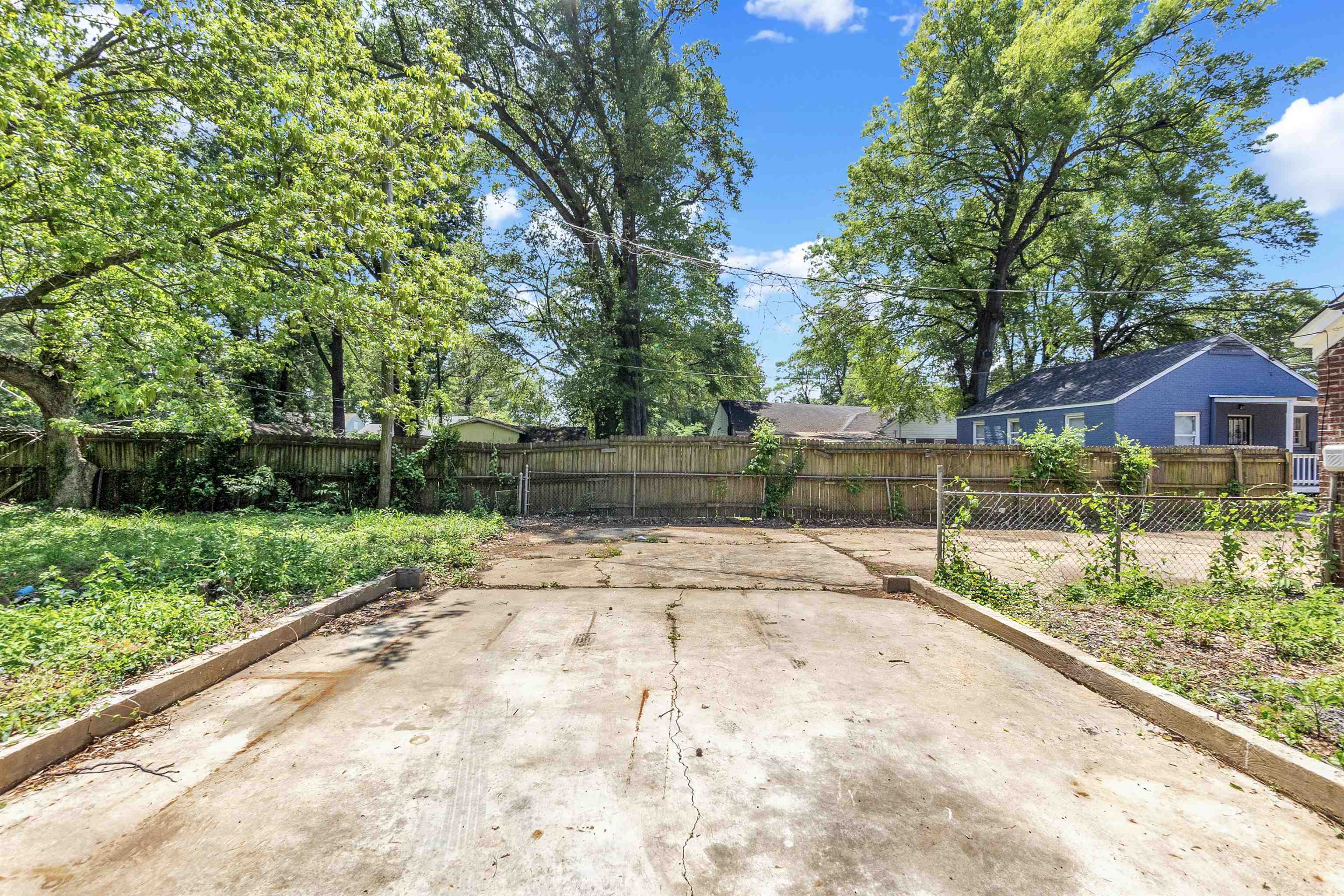 1682 Pendleton Street Memphis, TN 38114 - Photo 35 of 36 a view of backyard with green space