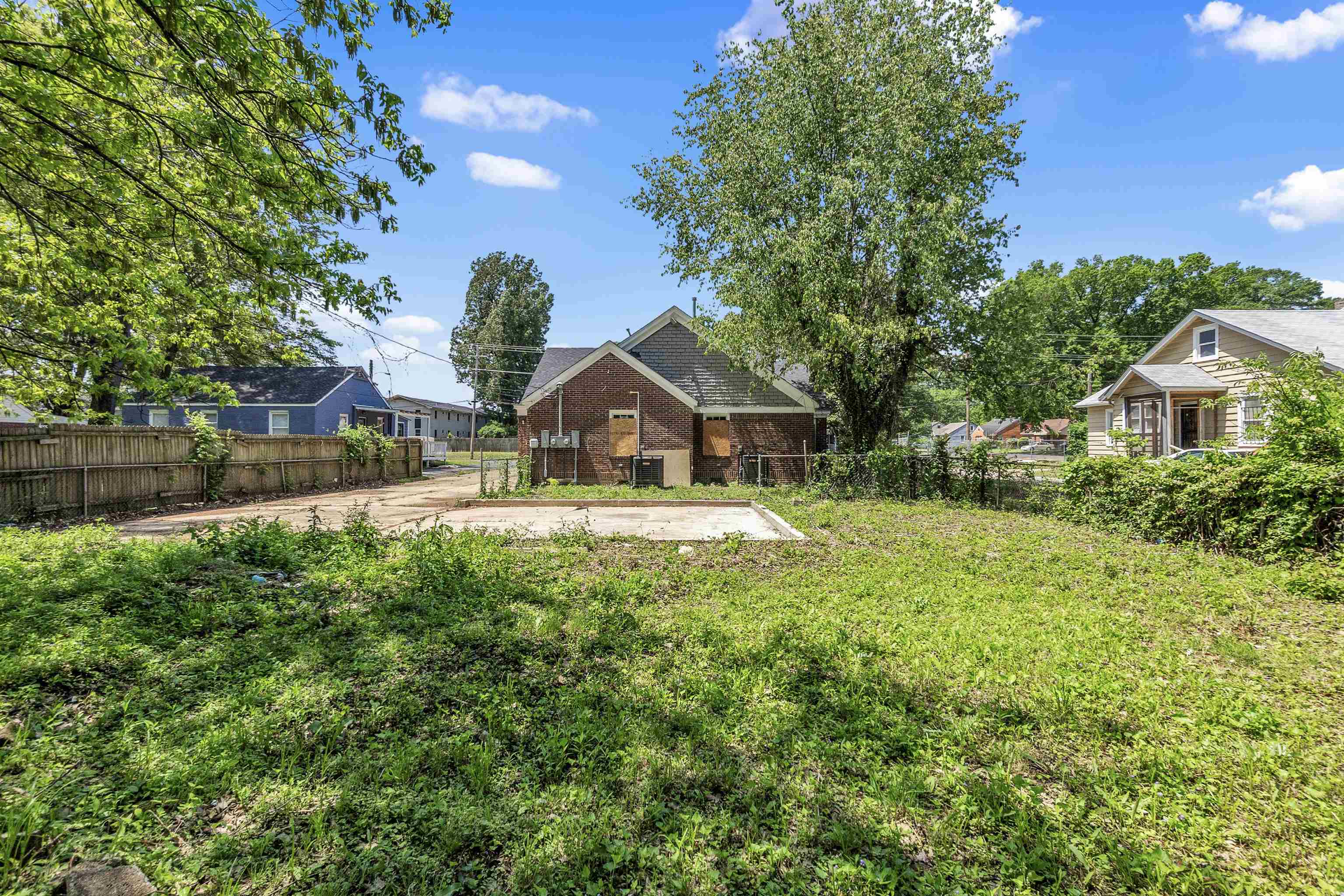 1682 Pendleton Street Memphis, TN 38114 - Photo 36 of 36 a front view of house with yard and green space